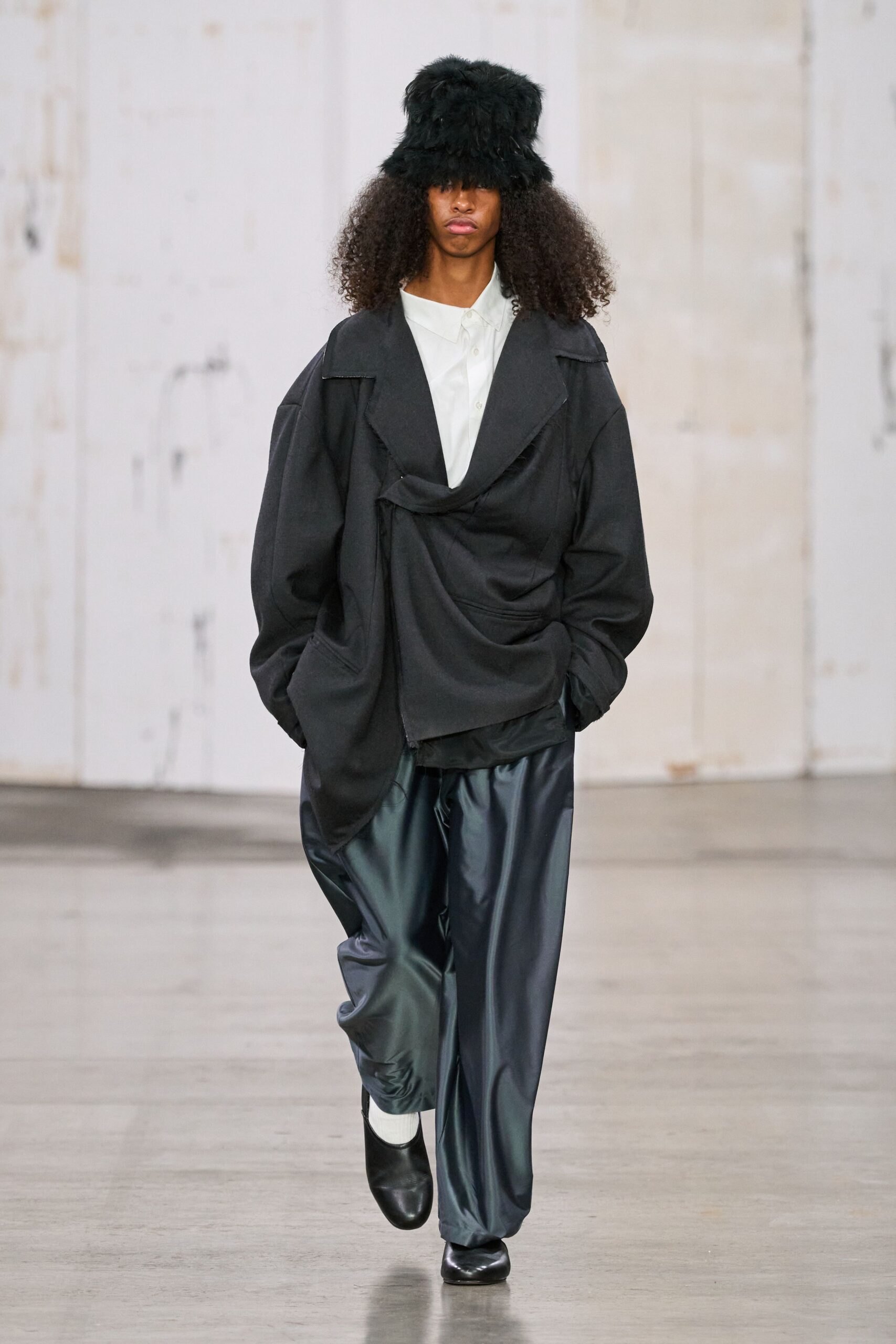 black wool long-sleeve collared oversized draped jacket
