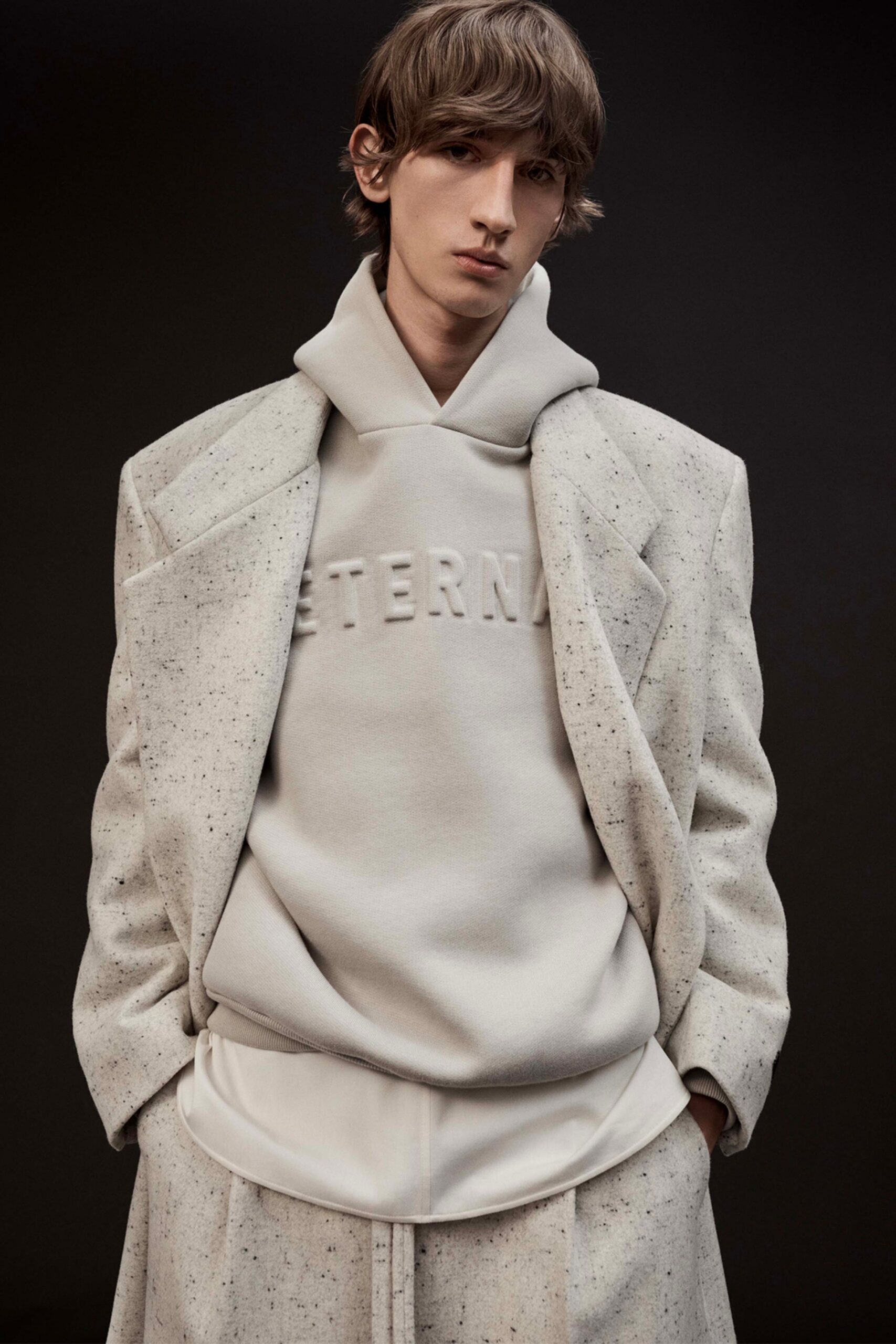 beige wool long-sleeve collared structured buttoned jacket