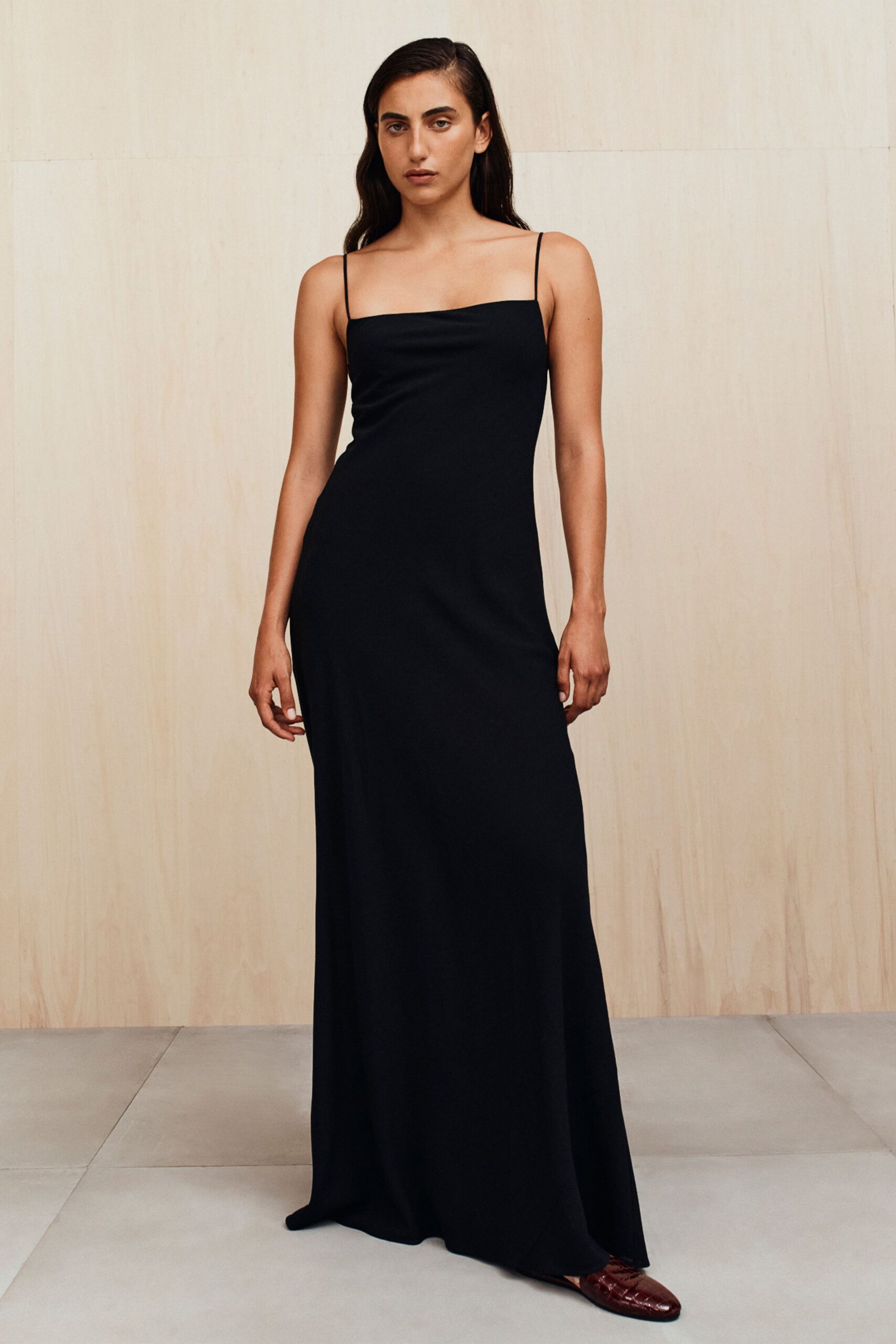 black fitted sleeveless gown