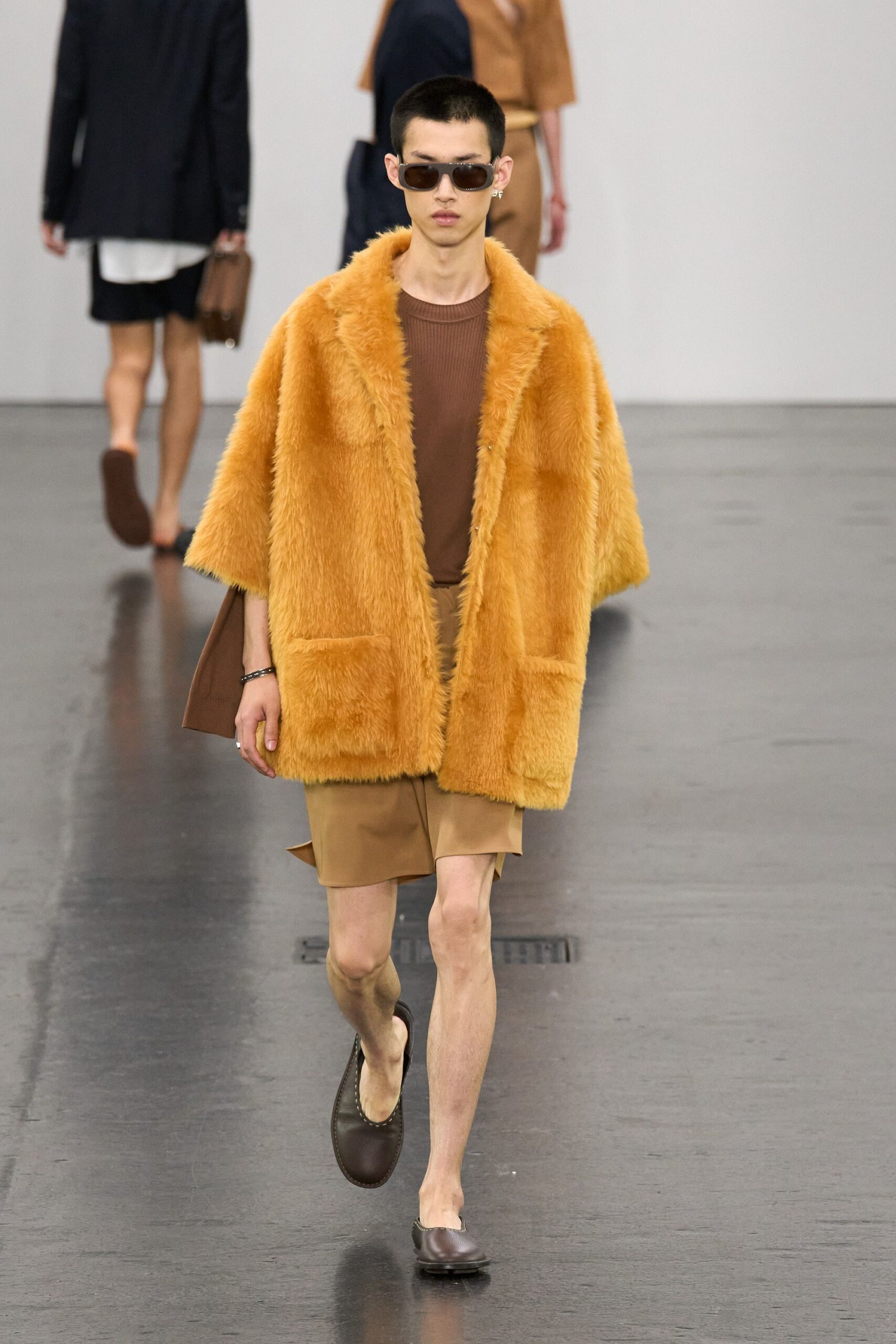 orange faux-fur coat with brown top
