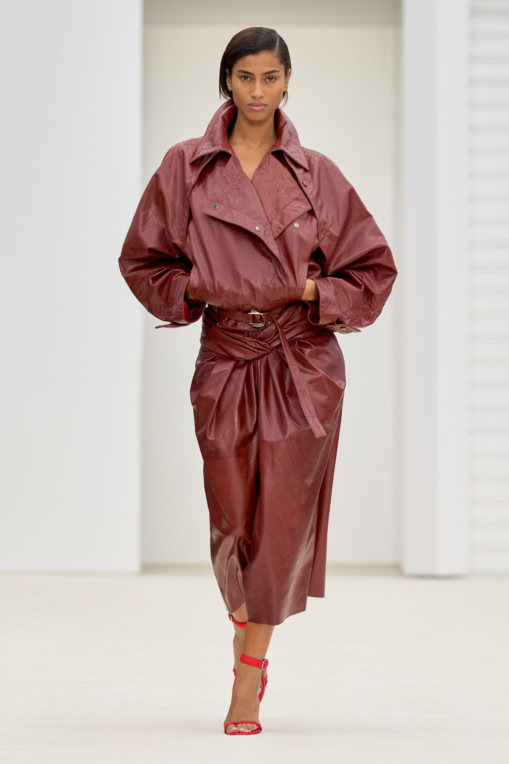 red leather long-sleeve collared oversized belted midi coat