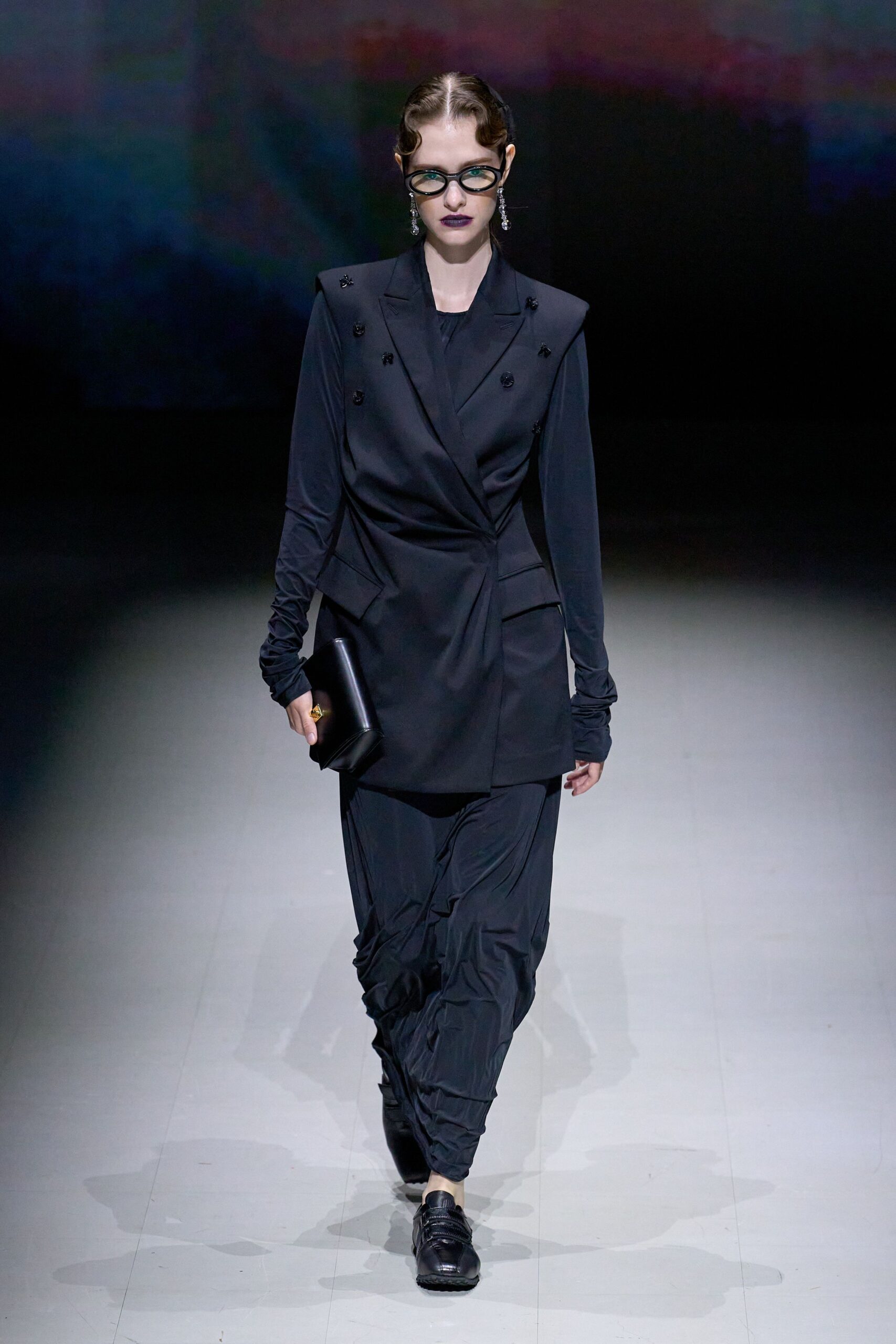 black fitted blazer and relaxed pants