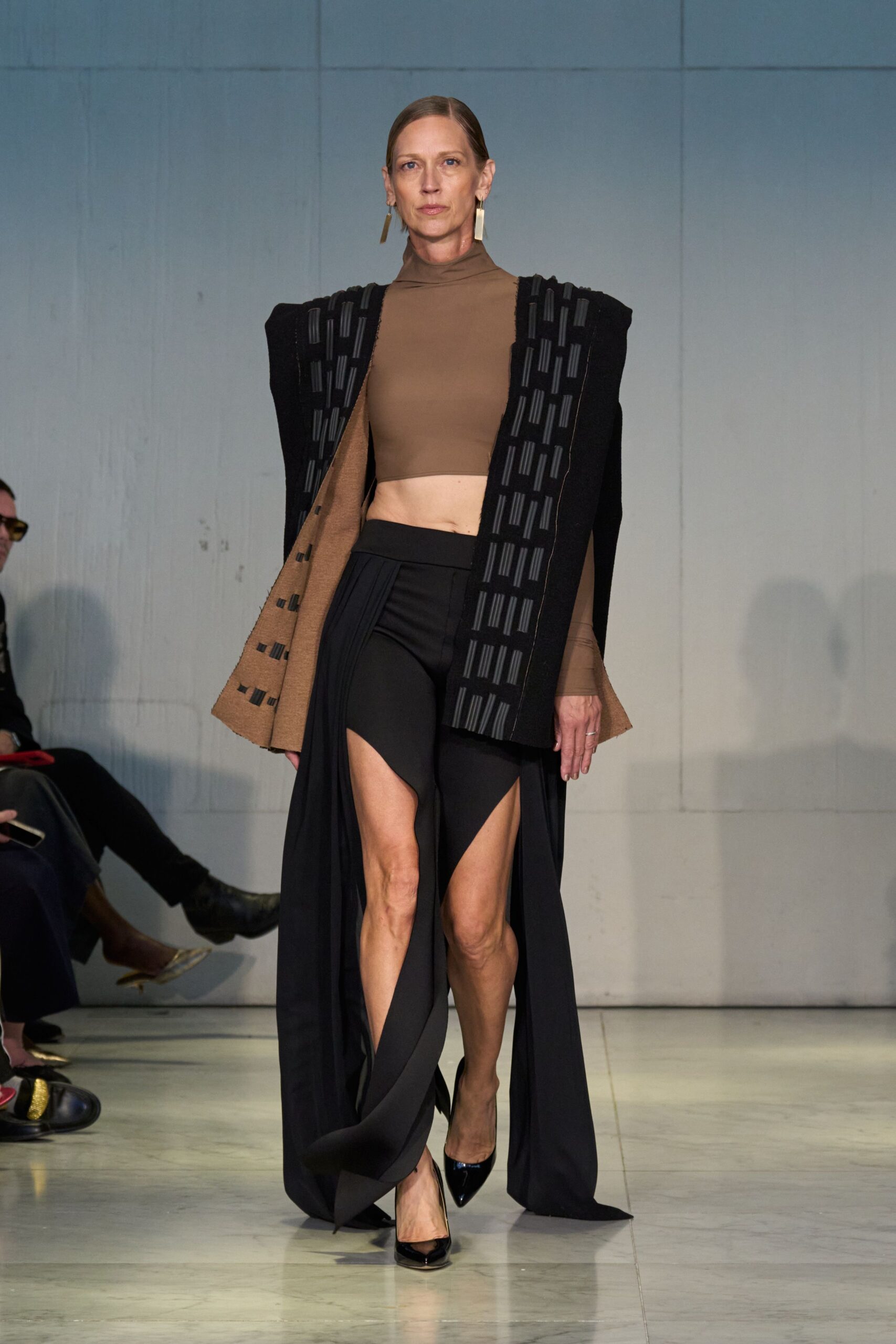 brown fitted top with asymmetric black skirt