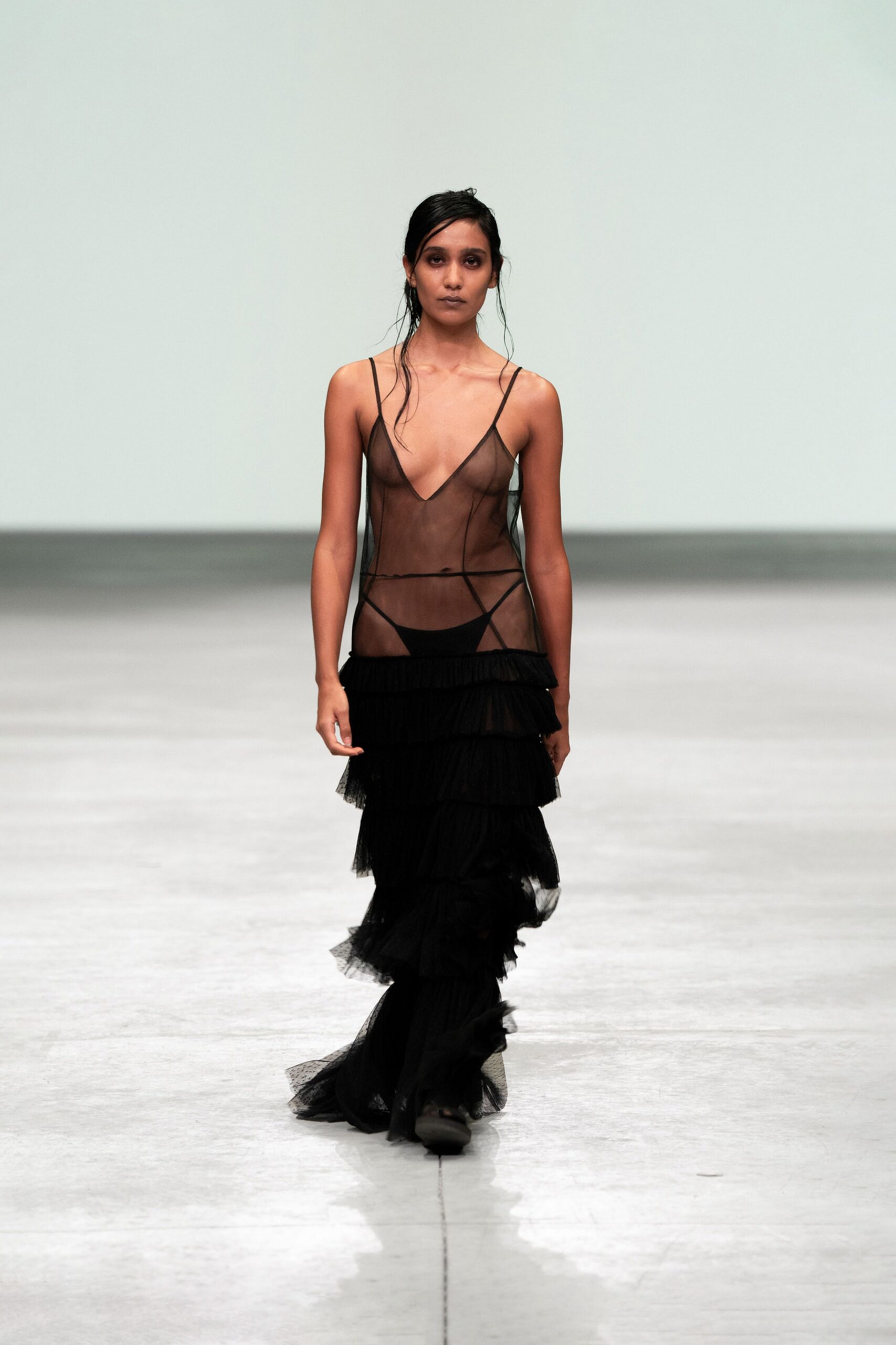 black sheer ruffled gown