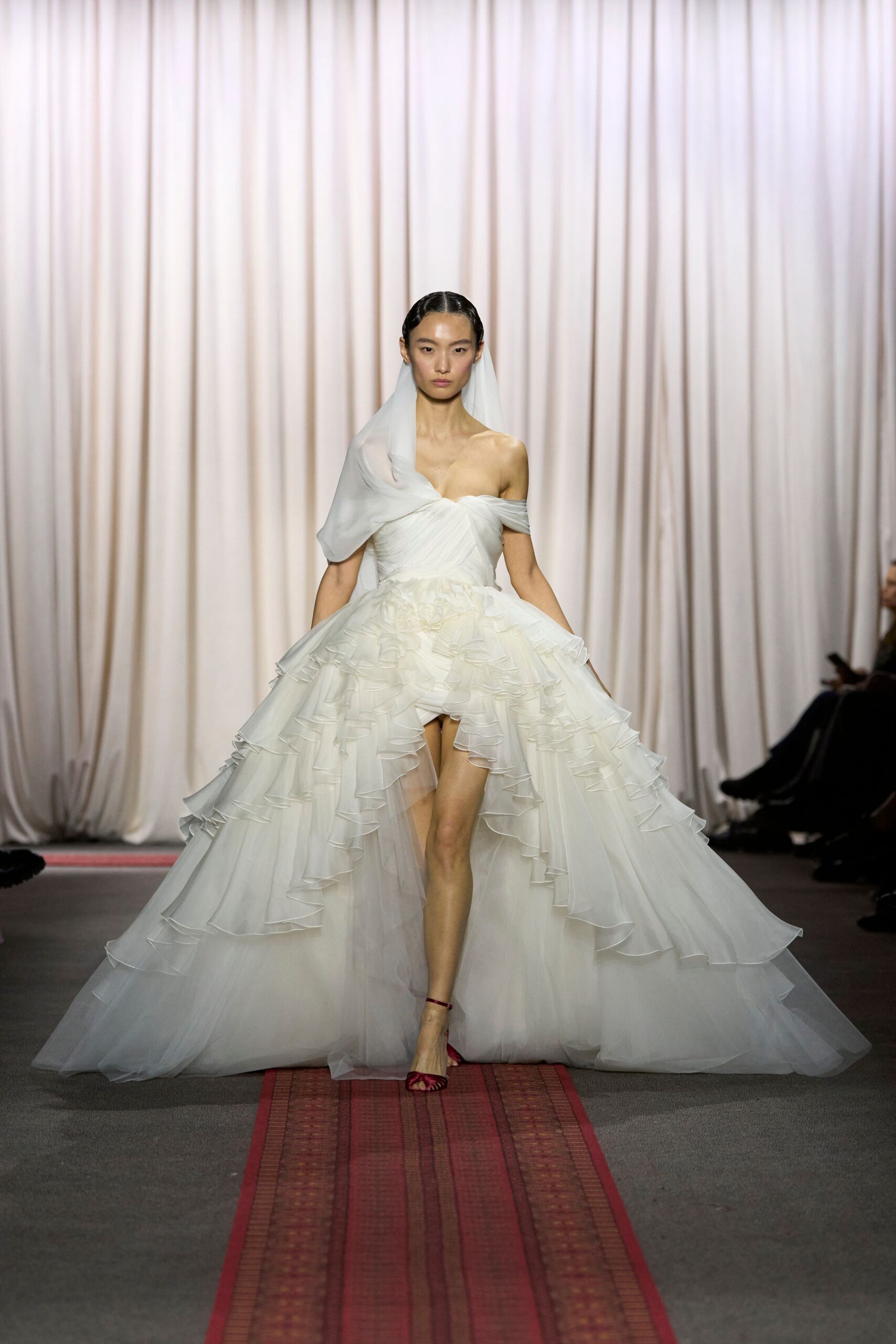 white tulle strapless off-shoulder fitted ruffled layered gown