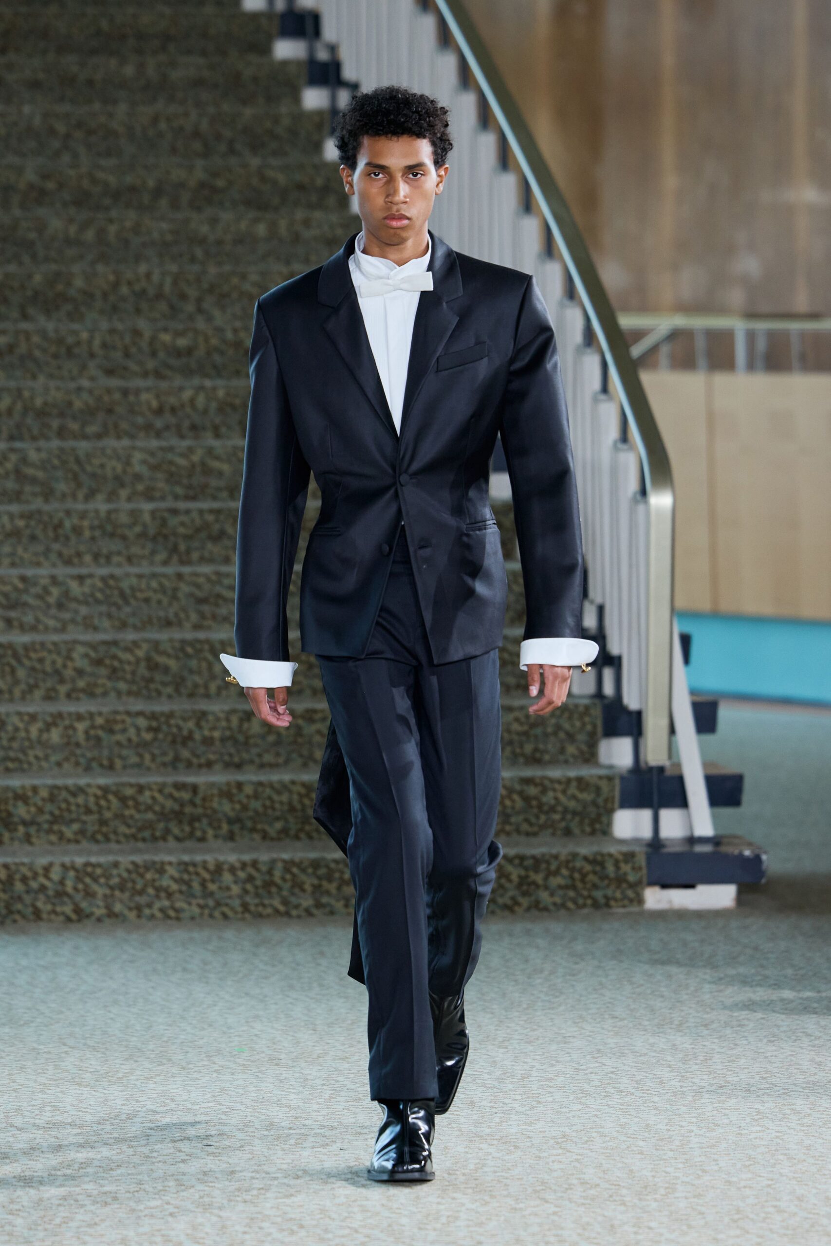 black tailored suit with white shirt