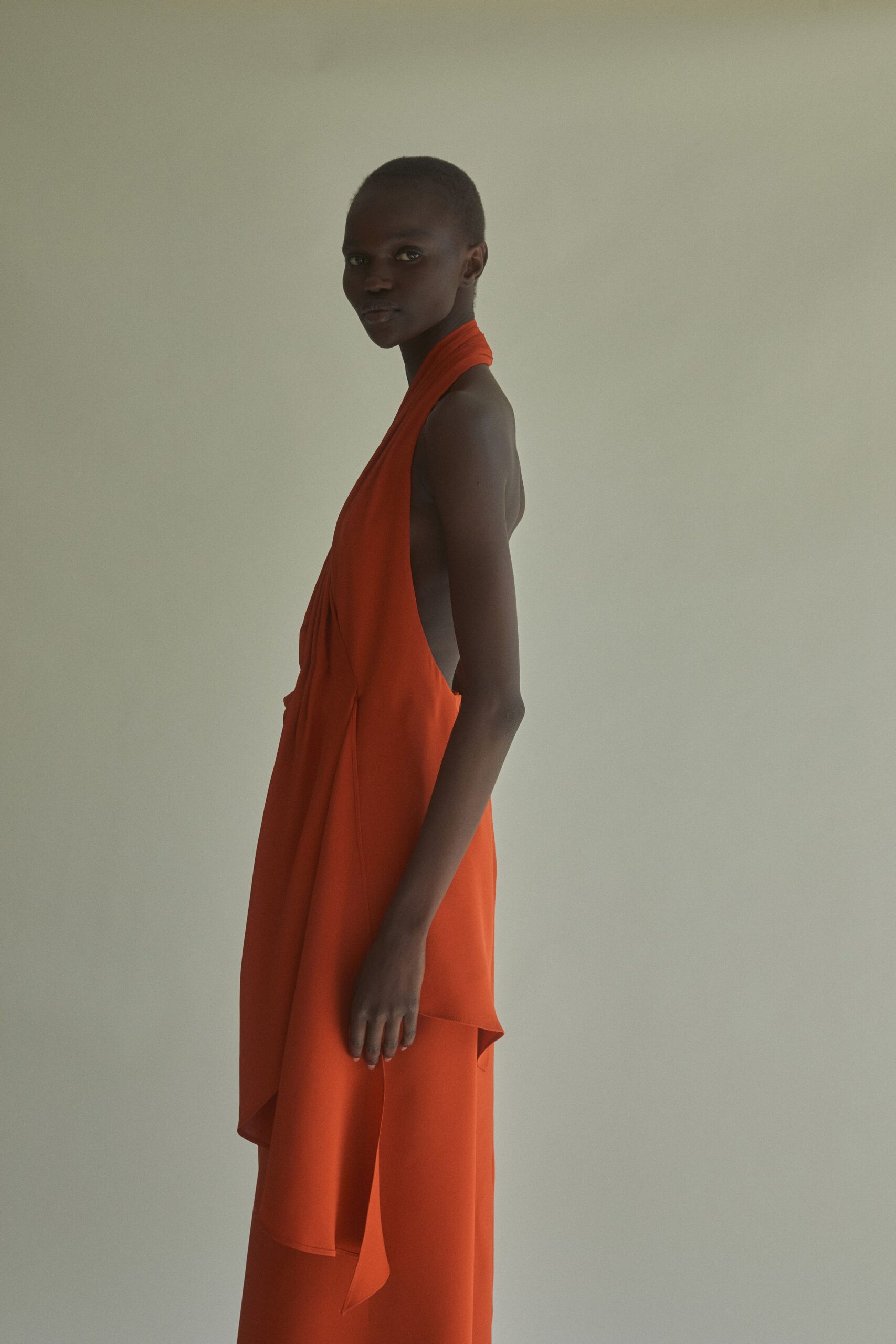 fitted orange silk dress