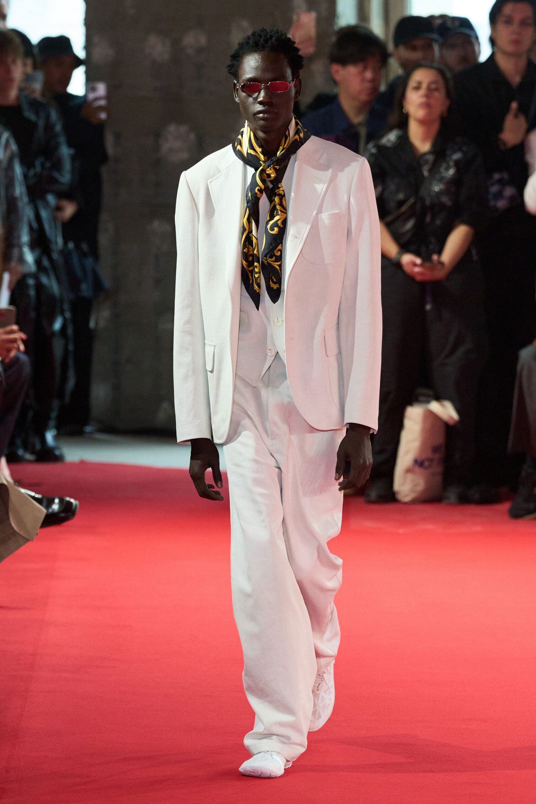 white tailored suit with scarf
