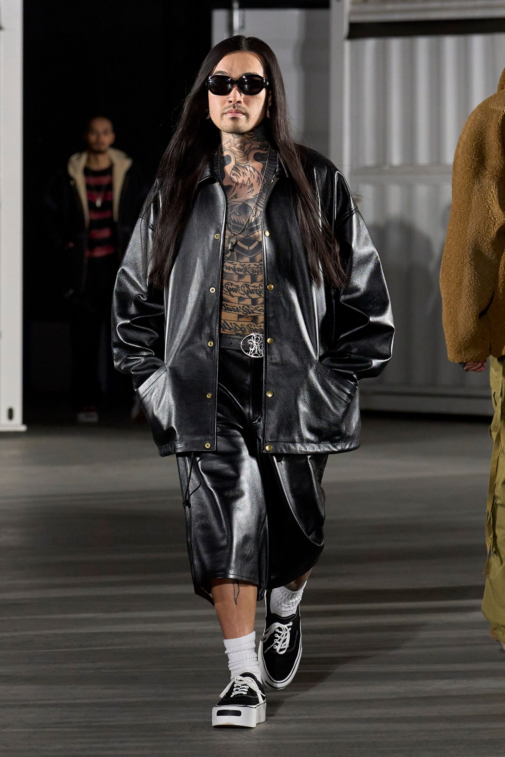 black leather oversized jacket and shorts