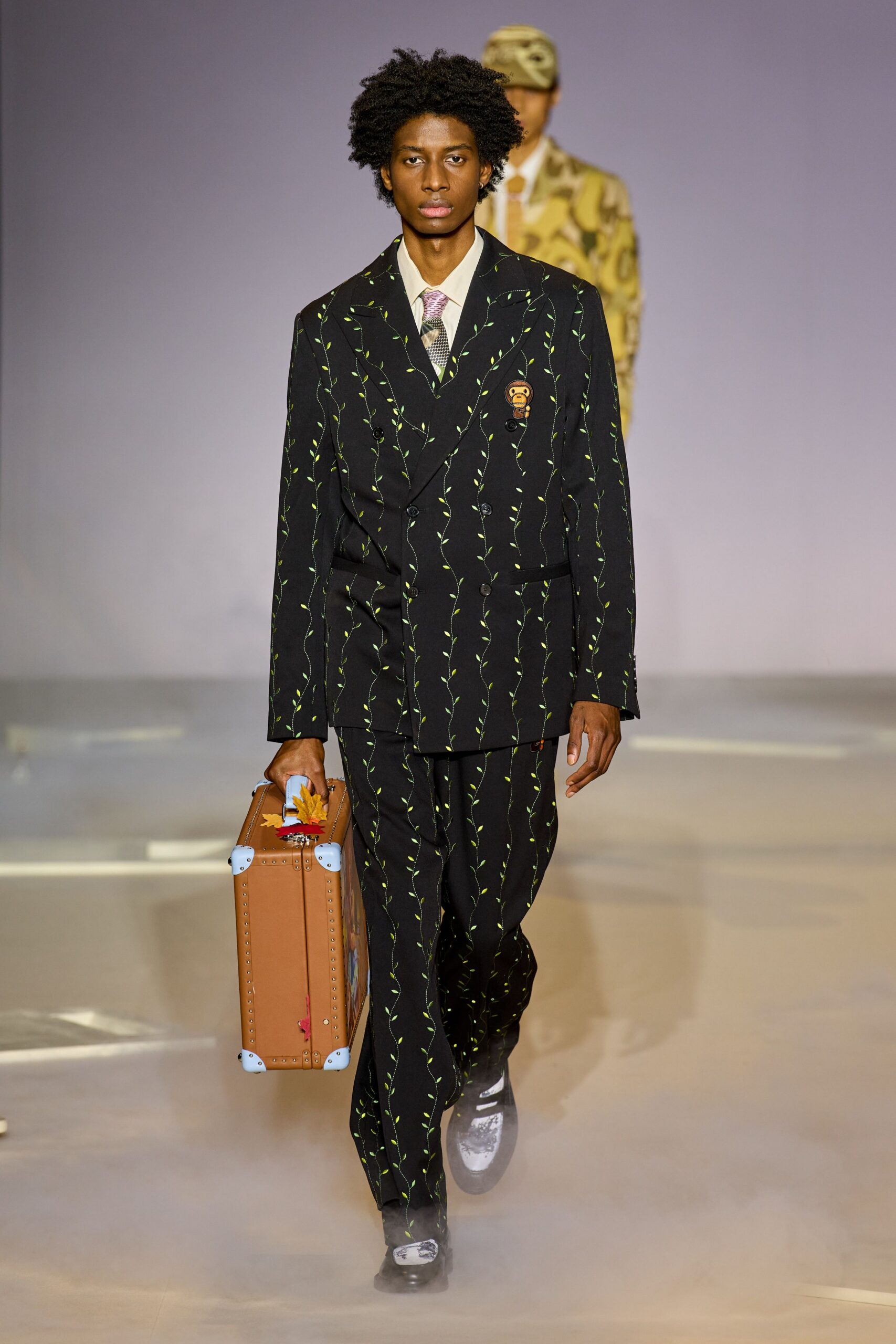 black tailored suit with bag