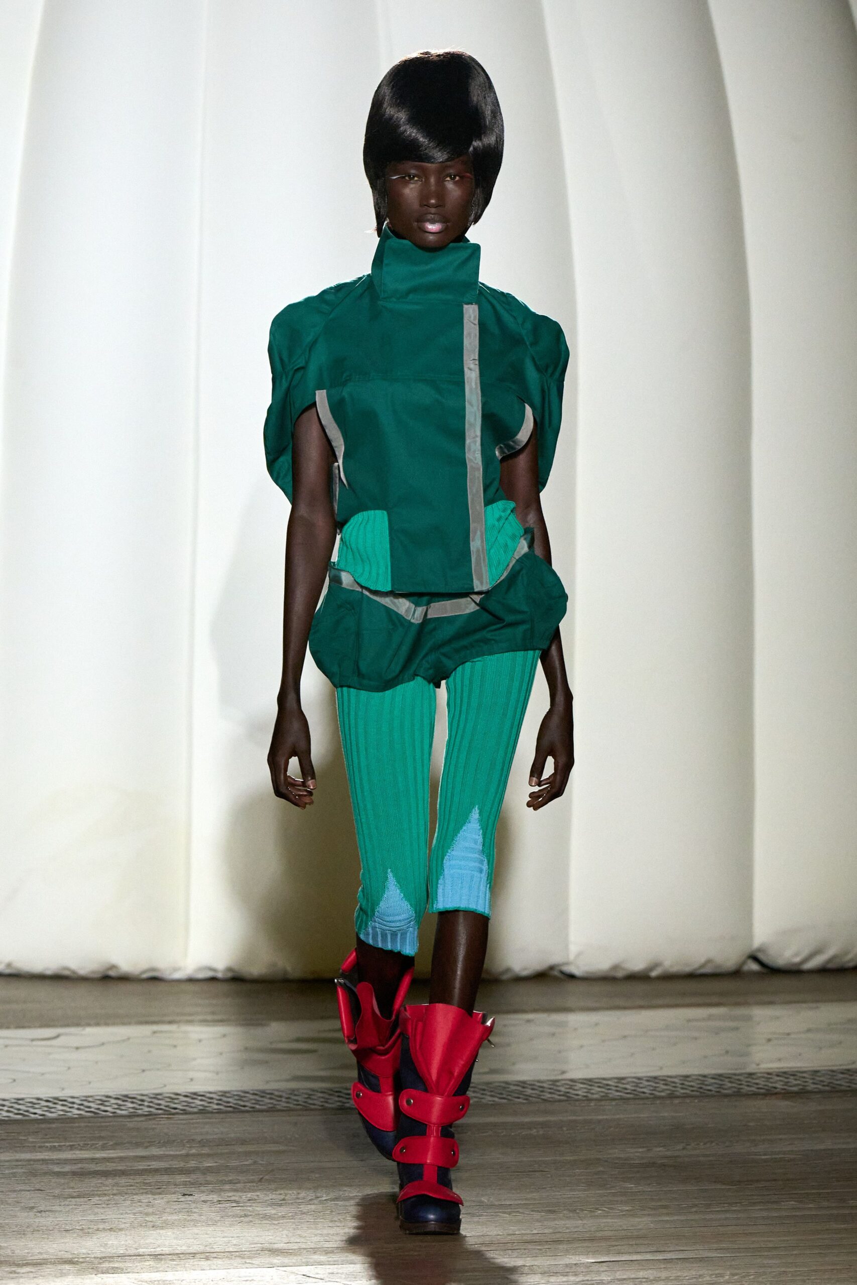 green neoprene short-sleeve collared fitted layered jacket