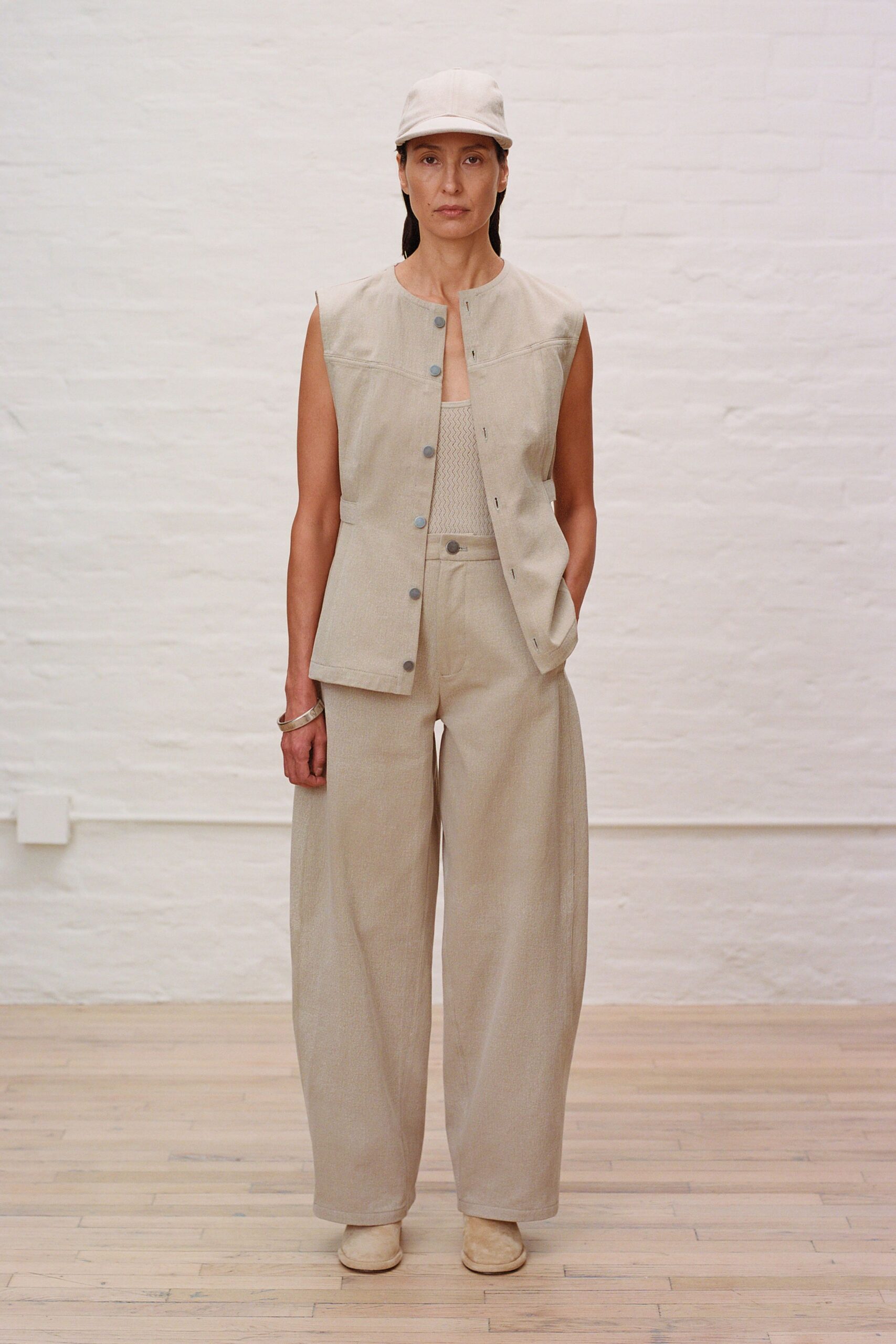 beige cotton sleeveless collared relaxed buttoned vest