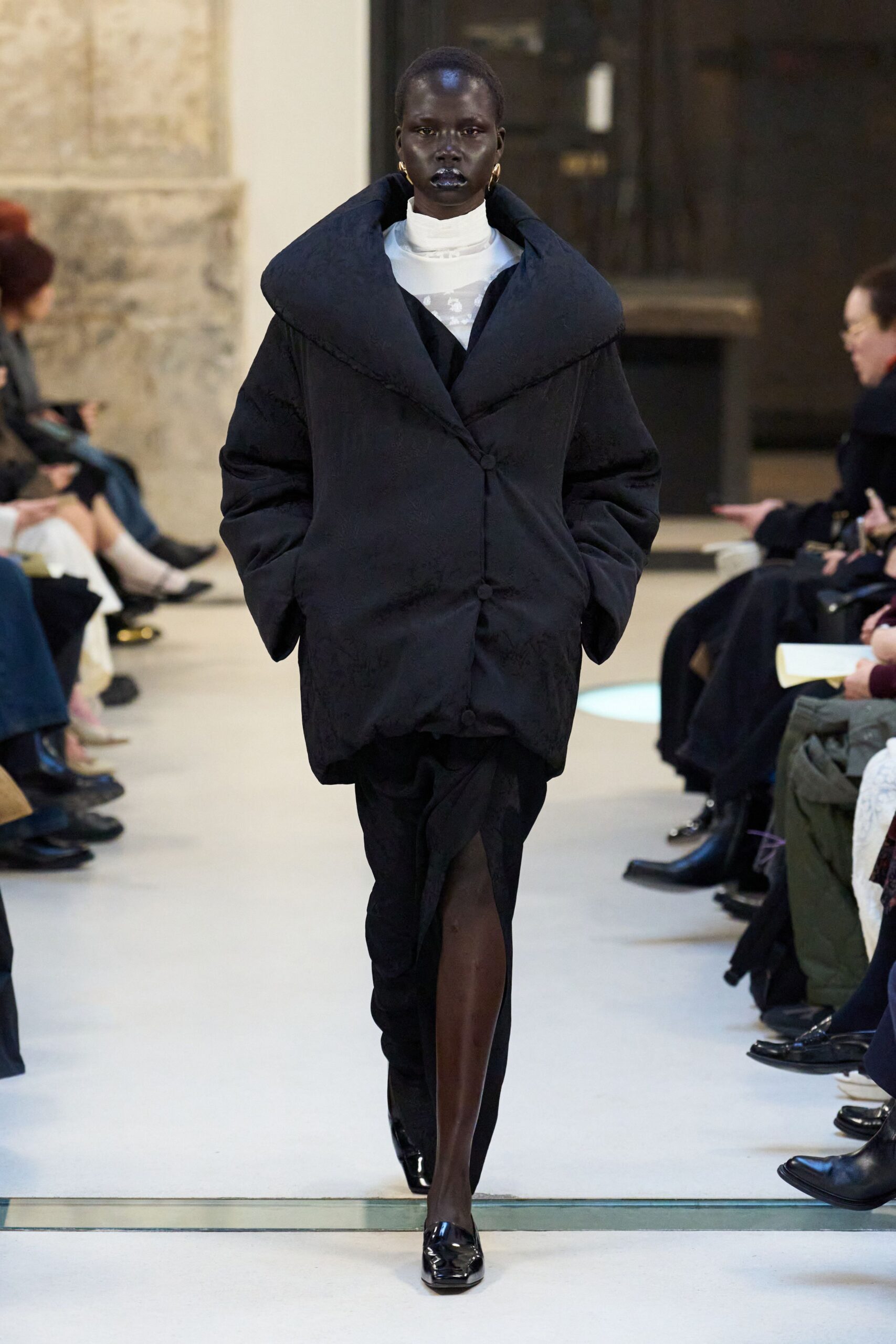 oversized black coat with fitted dress