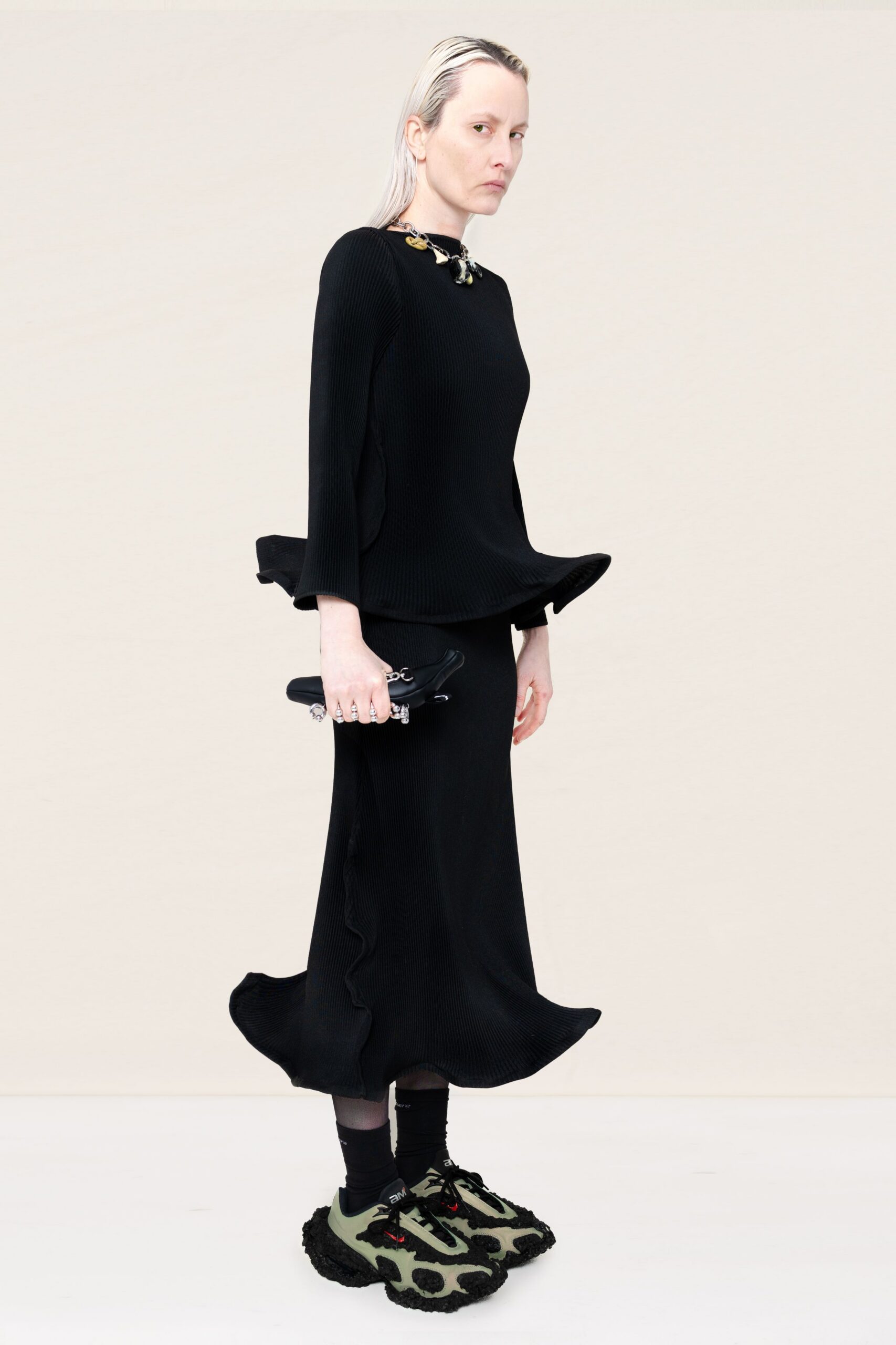 black knit asymmetric fitted draped midi skirt