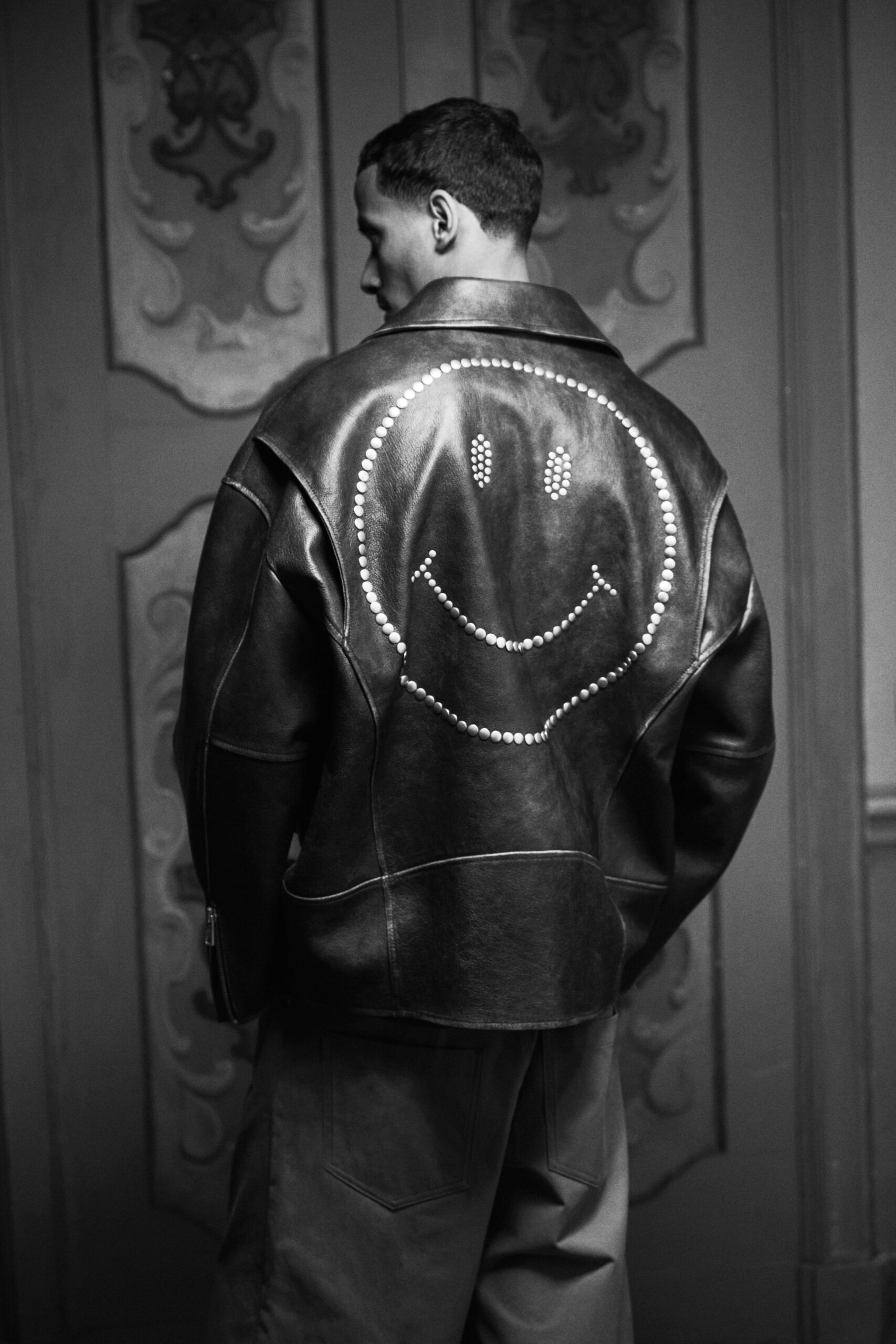black leather long-sleeve collared oversized embroidered jacket