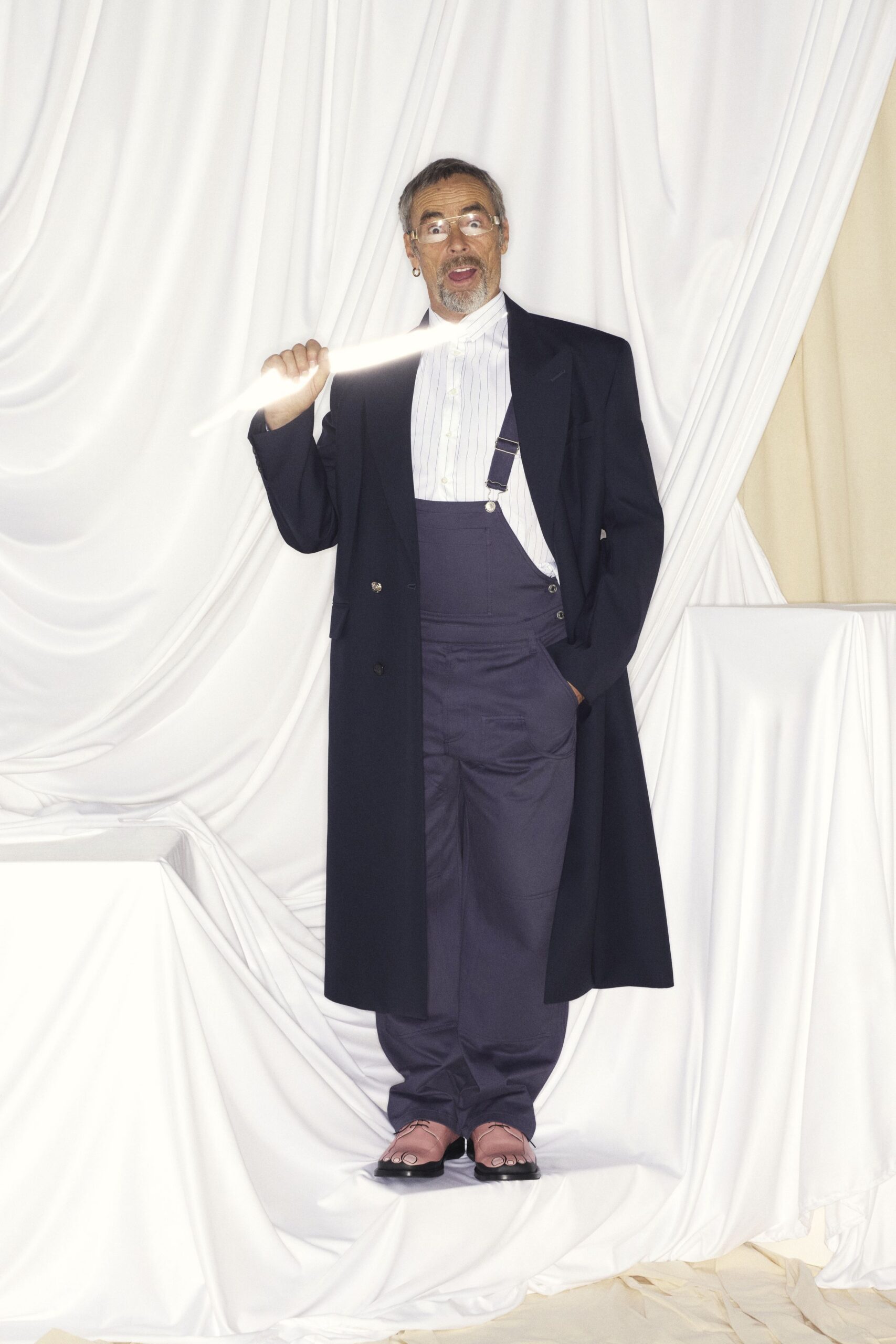 black coat navy pants pink shoes