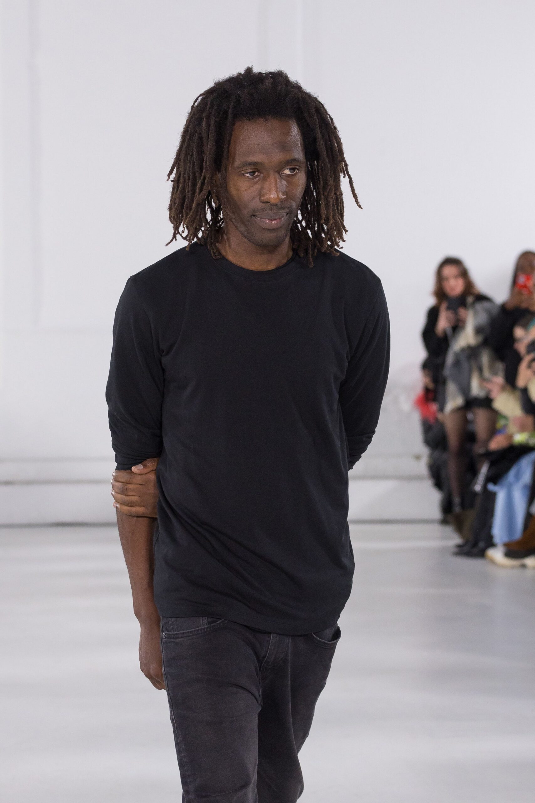 black relaxed shirt and slim pants