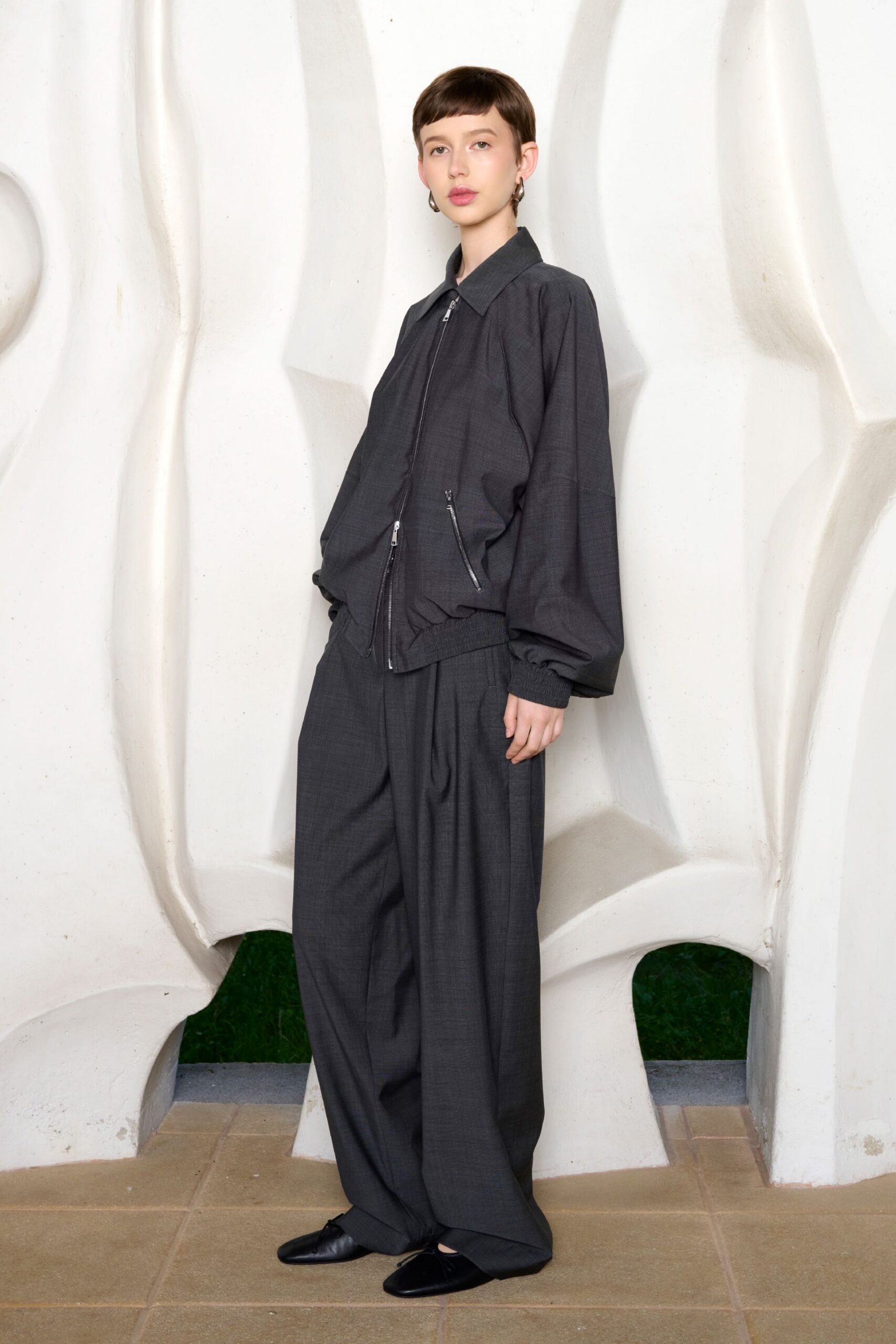 black oversized jacket and relaxed pants
