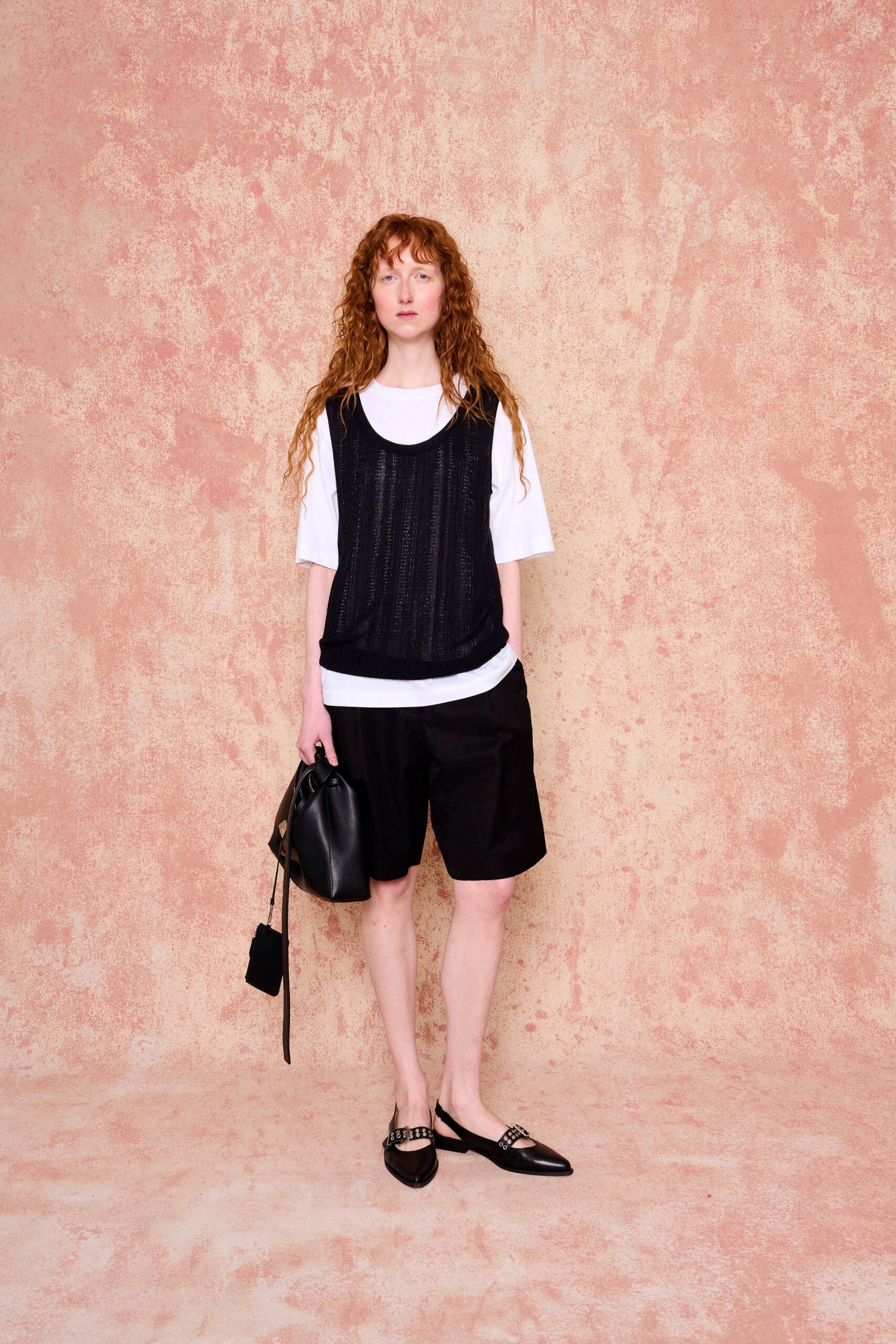 black relaxed top with white shirt