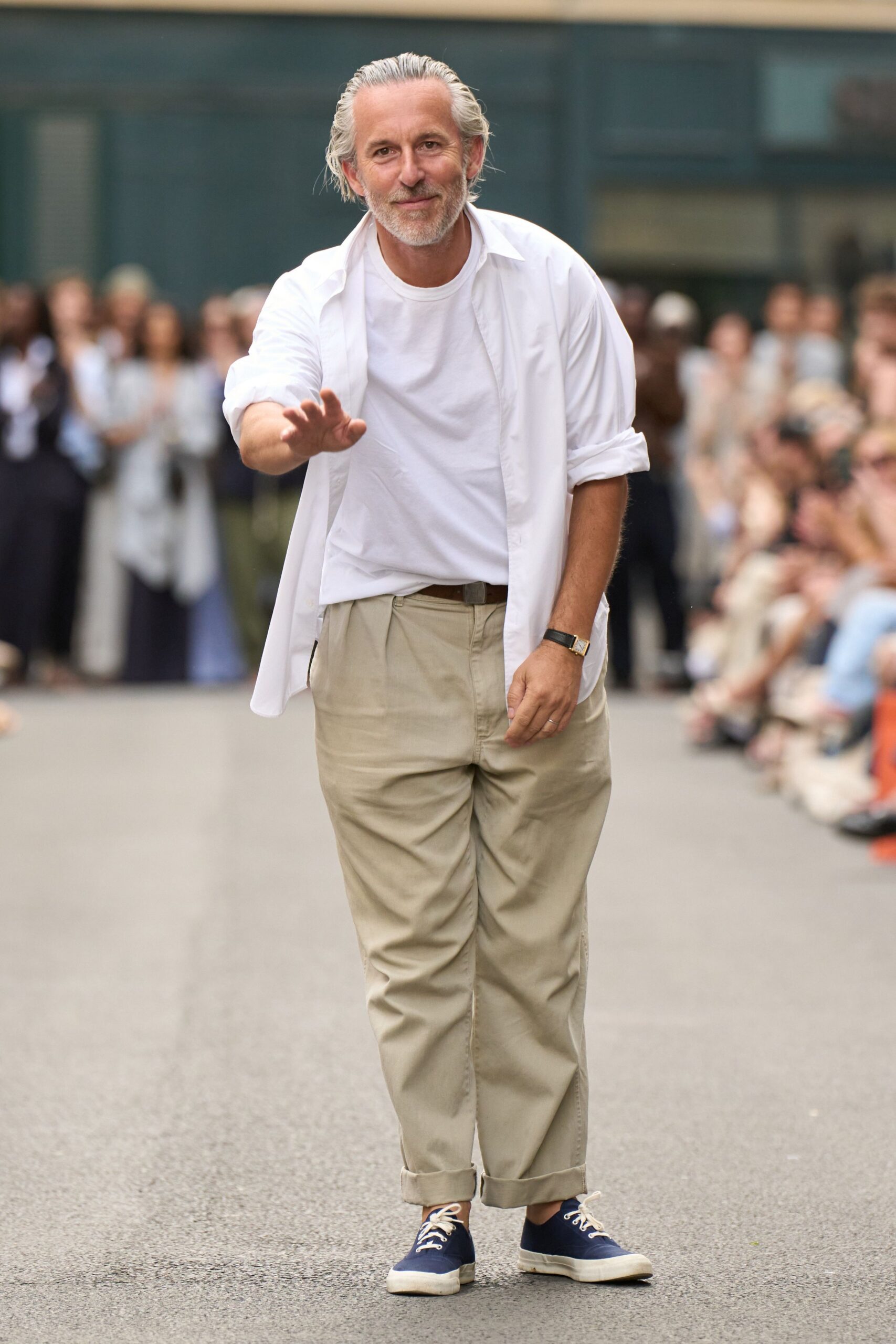 white shirt beige pants blue shoes