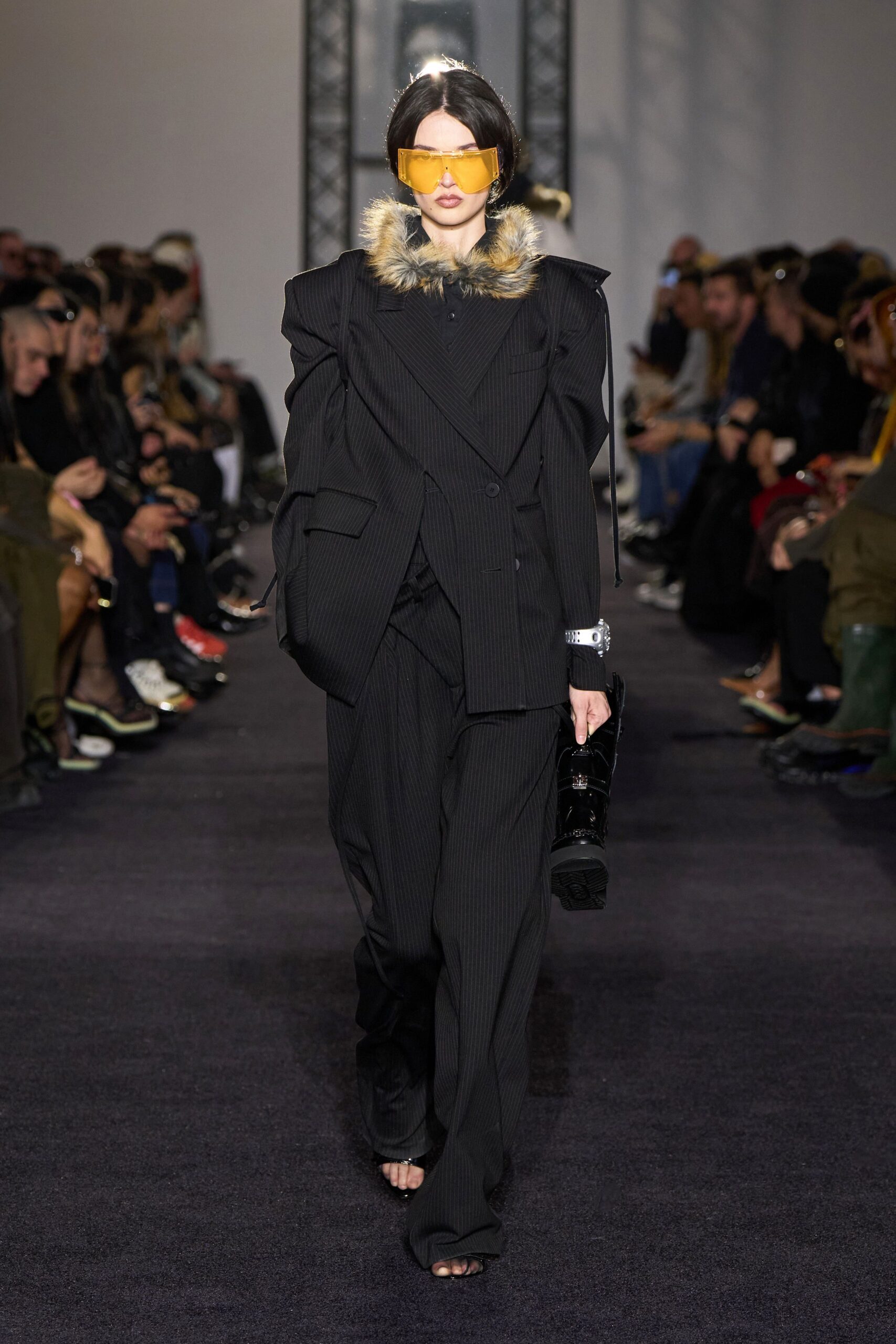 black tailored suit with sunglasses