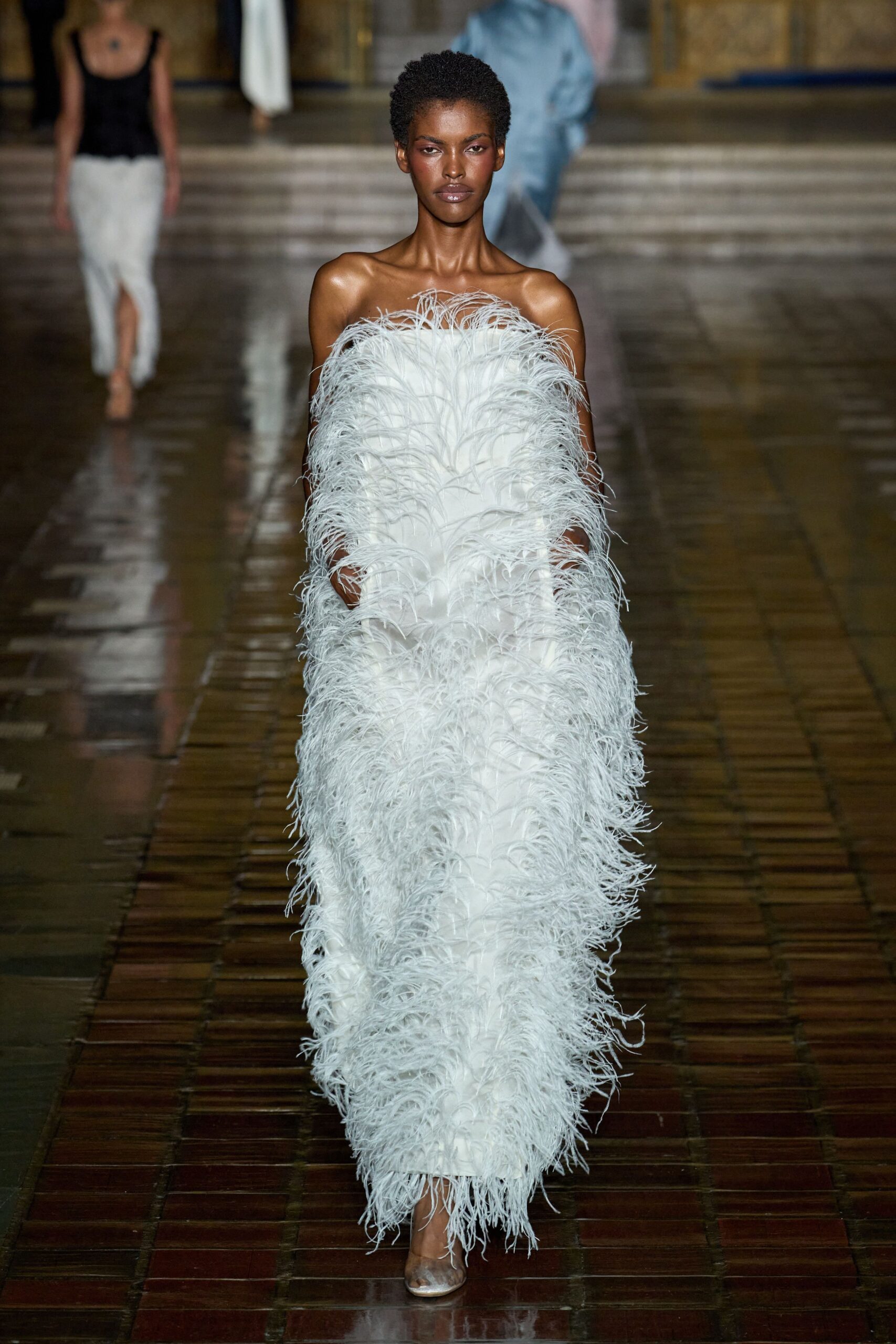 white fringed strapless gown