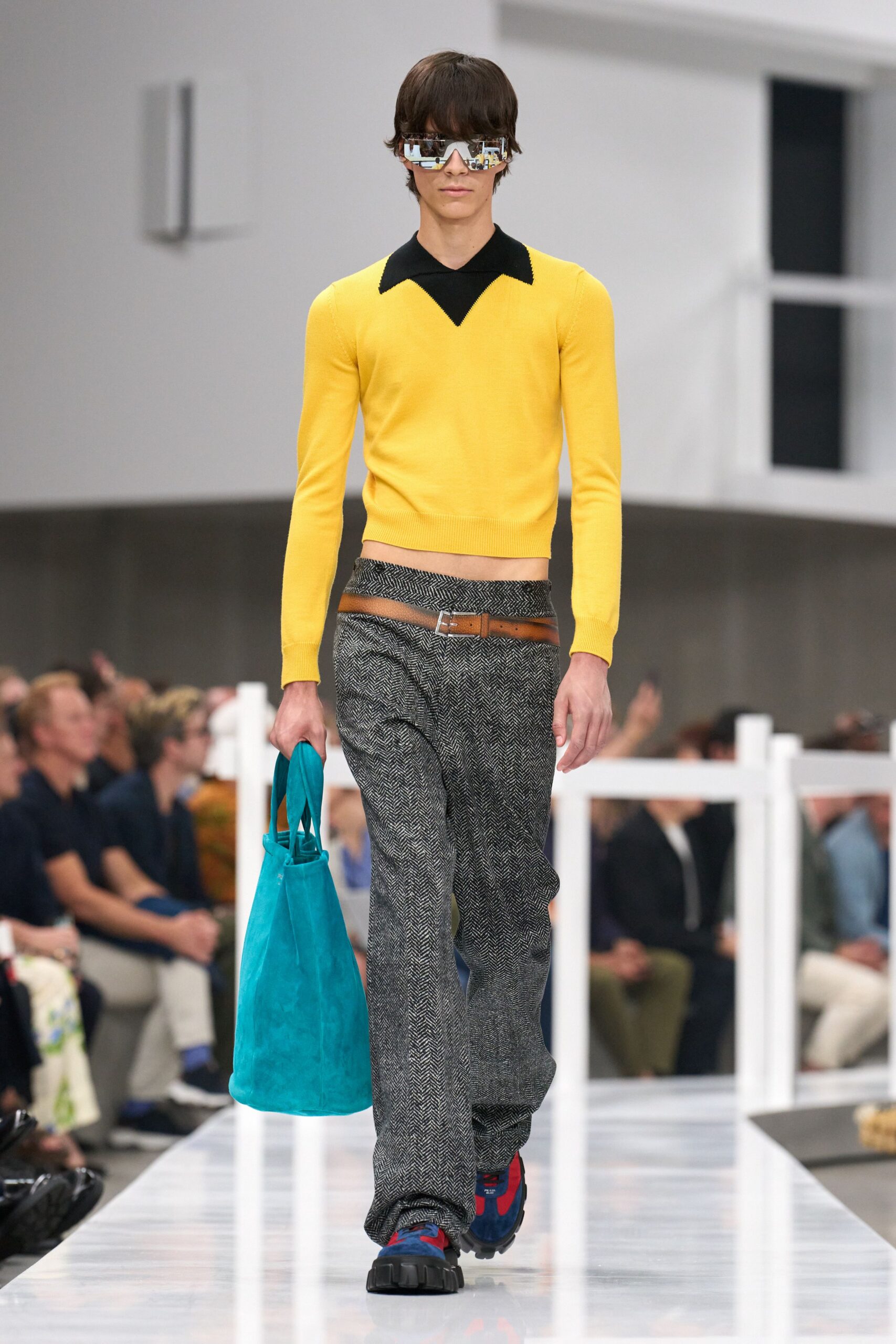 yellow fitted top with gray pants