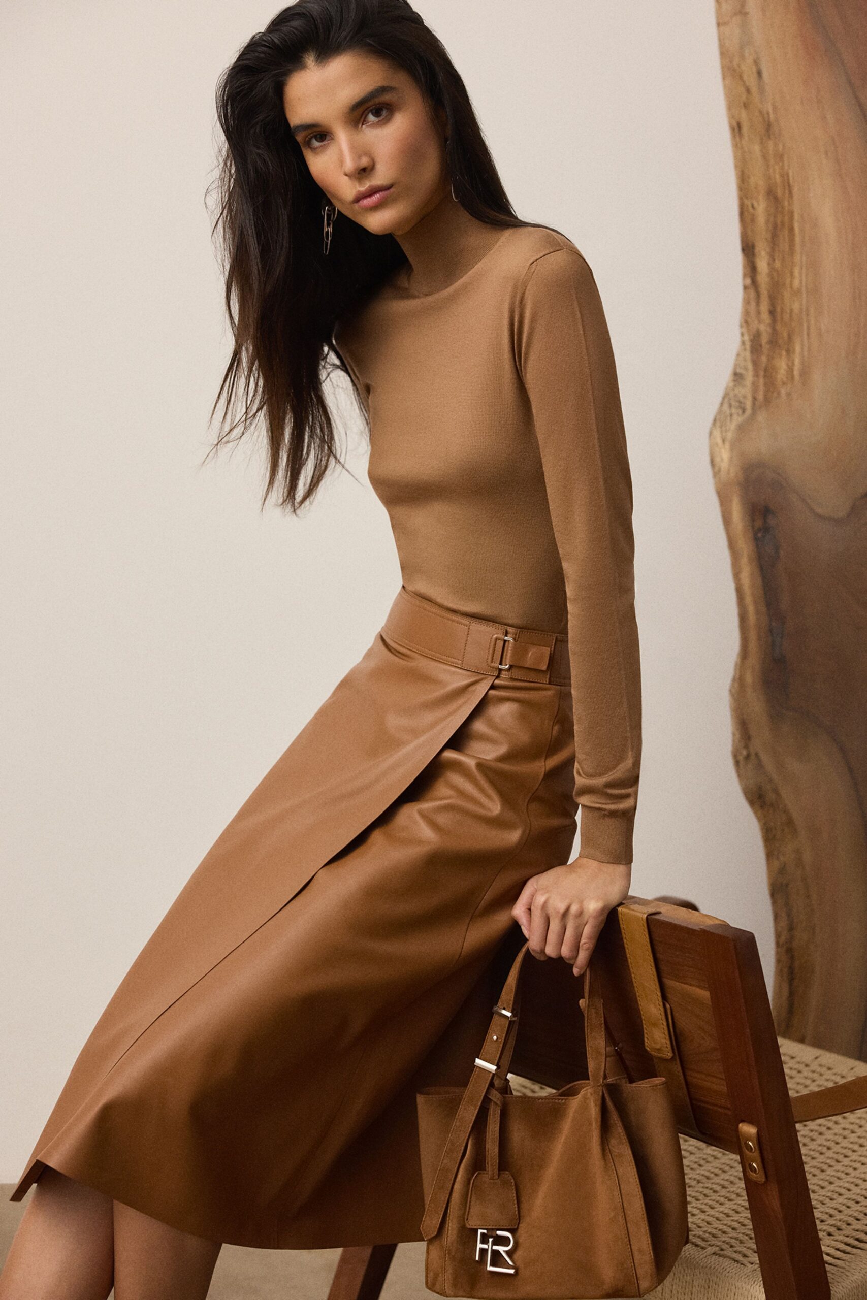 brown fitted top and skirt