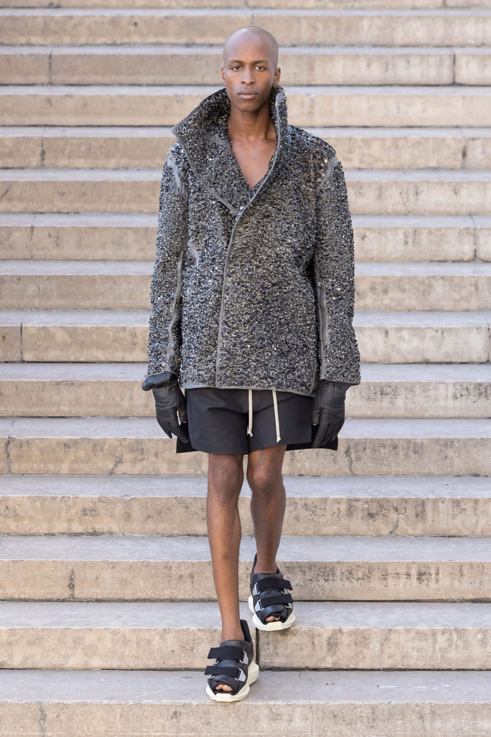 black wool long-sleeve collared oversized textured jacket