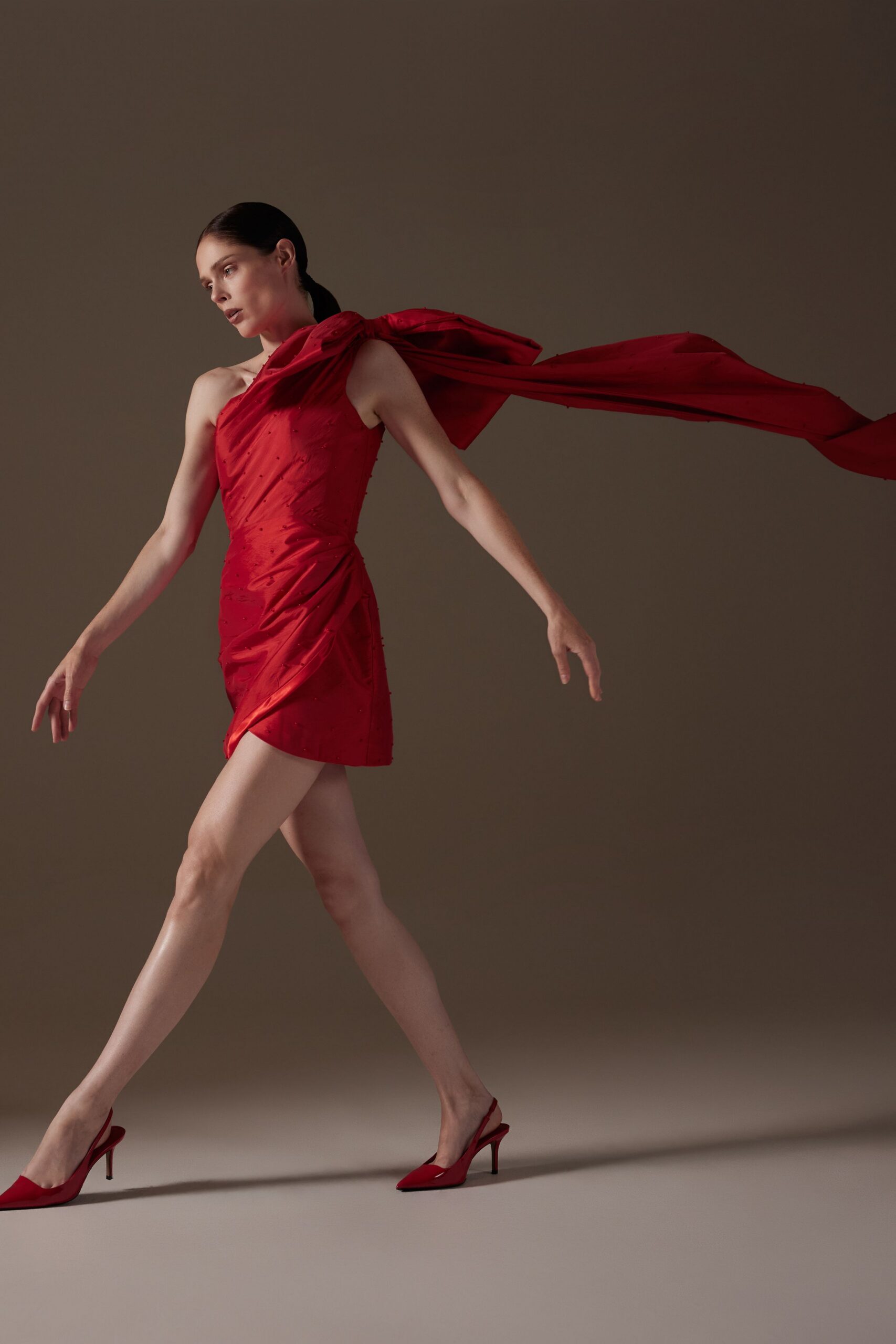 red silk sleeveless off-shoulder fitted draped mini dress