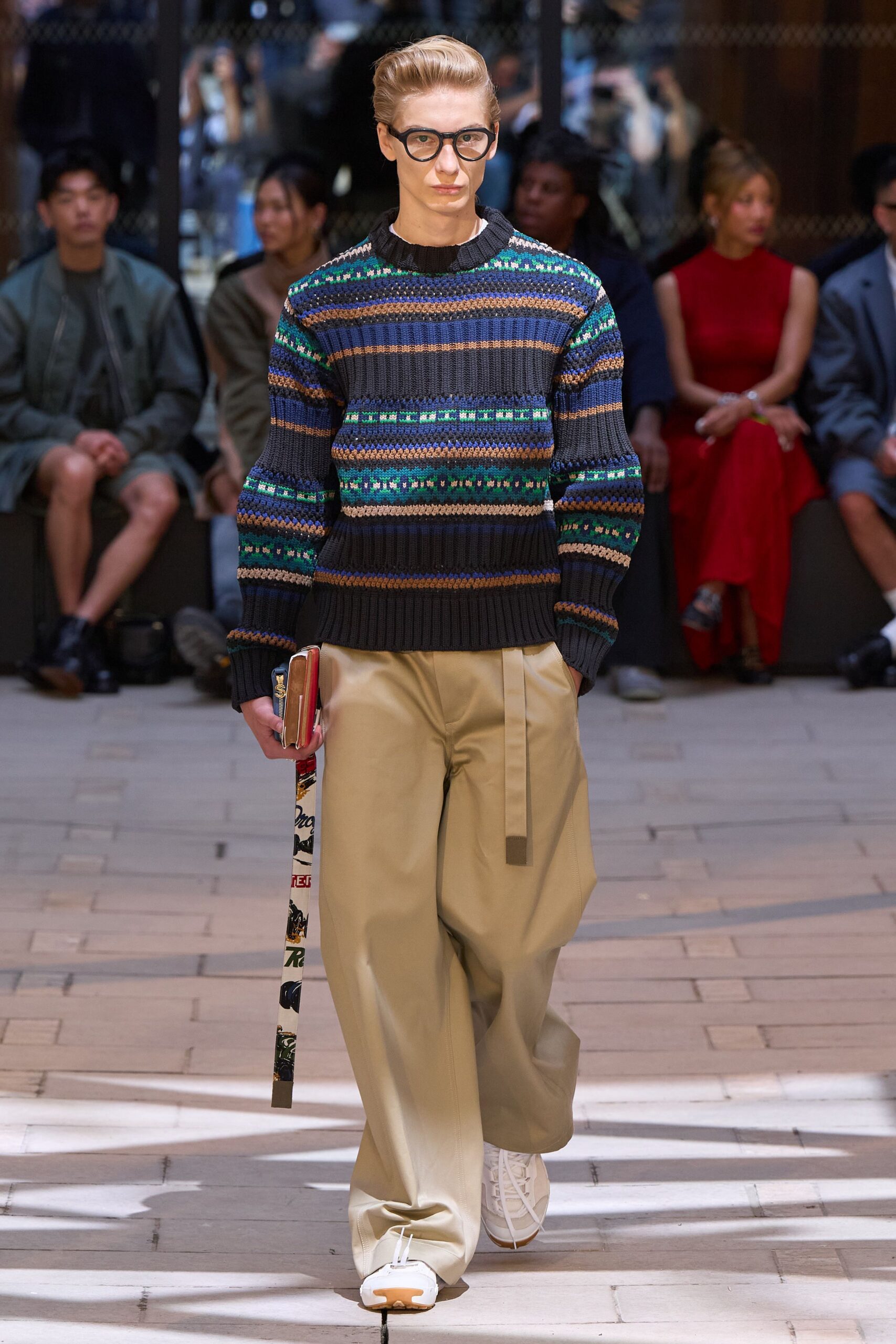 relaxed black wool sweater with beige pants