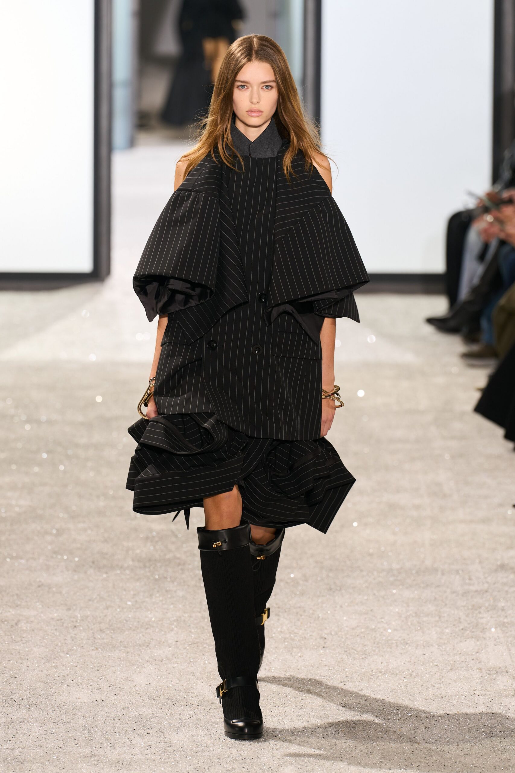 black pleated midi dress with boots
