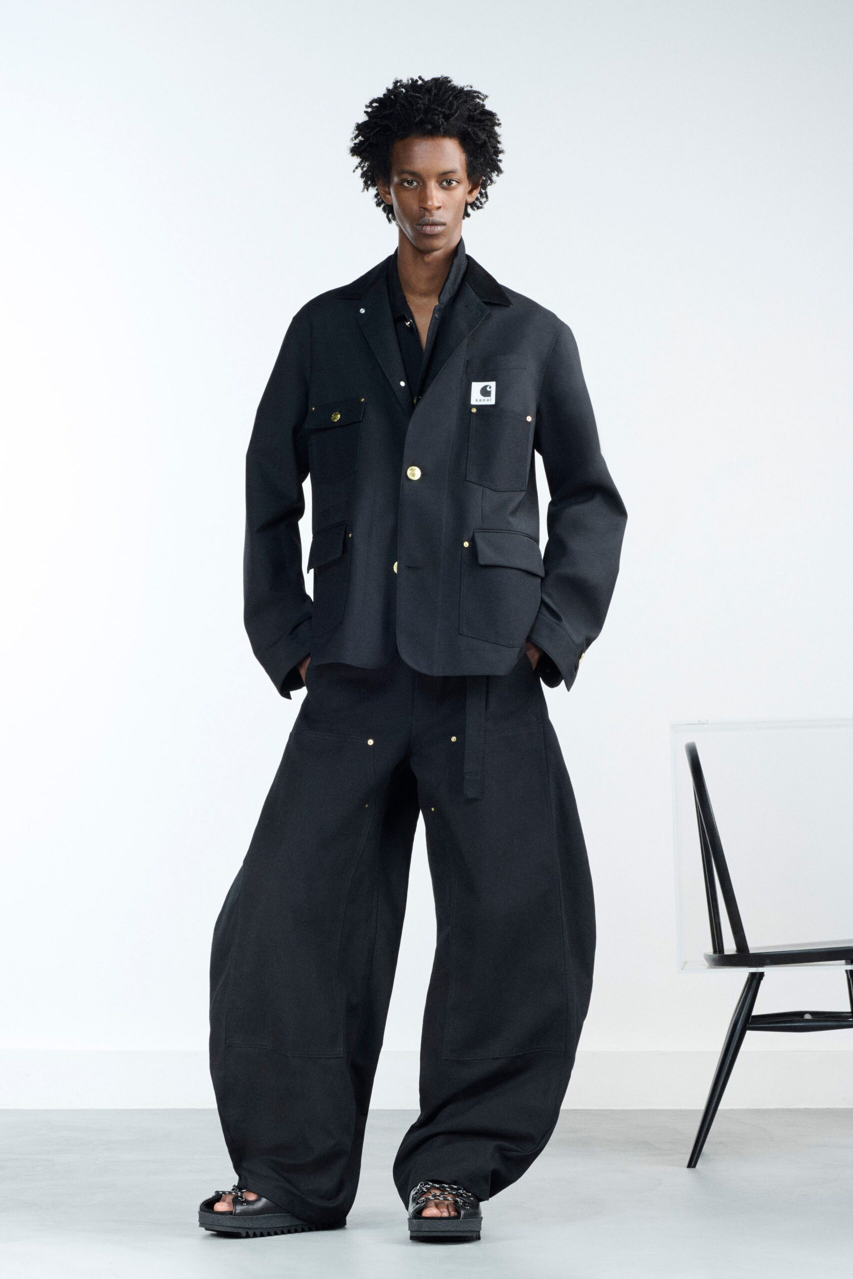 black cotton long-sleeve collared relaxed buttoned pockets blazer