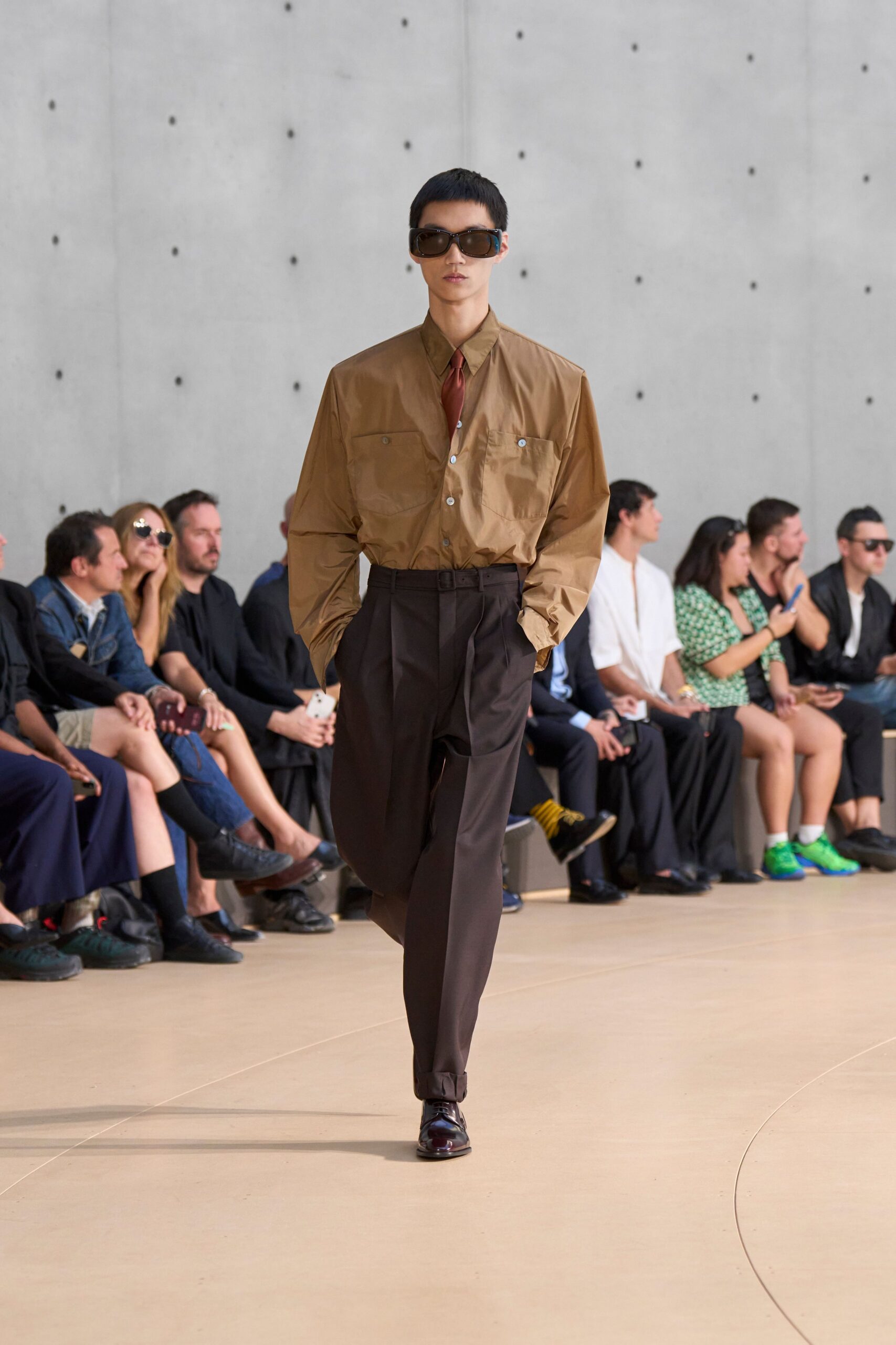 brown relaxed jacket with black pants