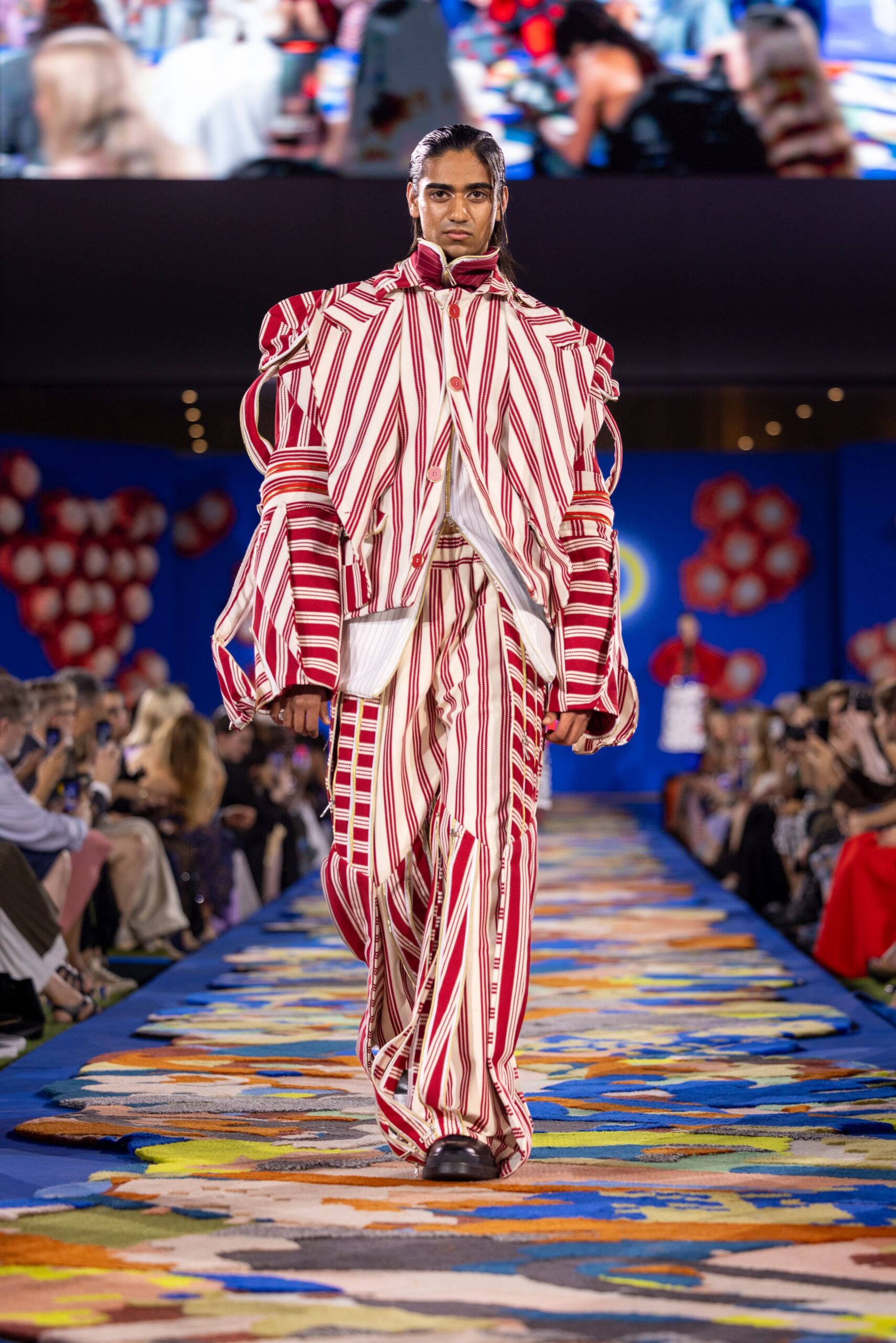 red and white striped oversized jacket and relaxed pants