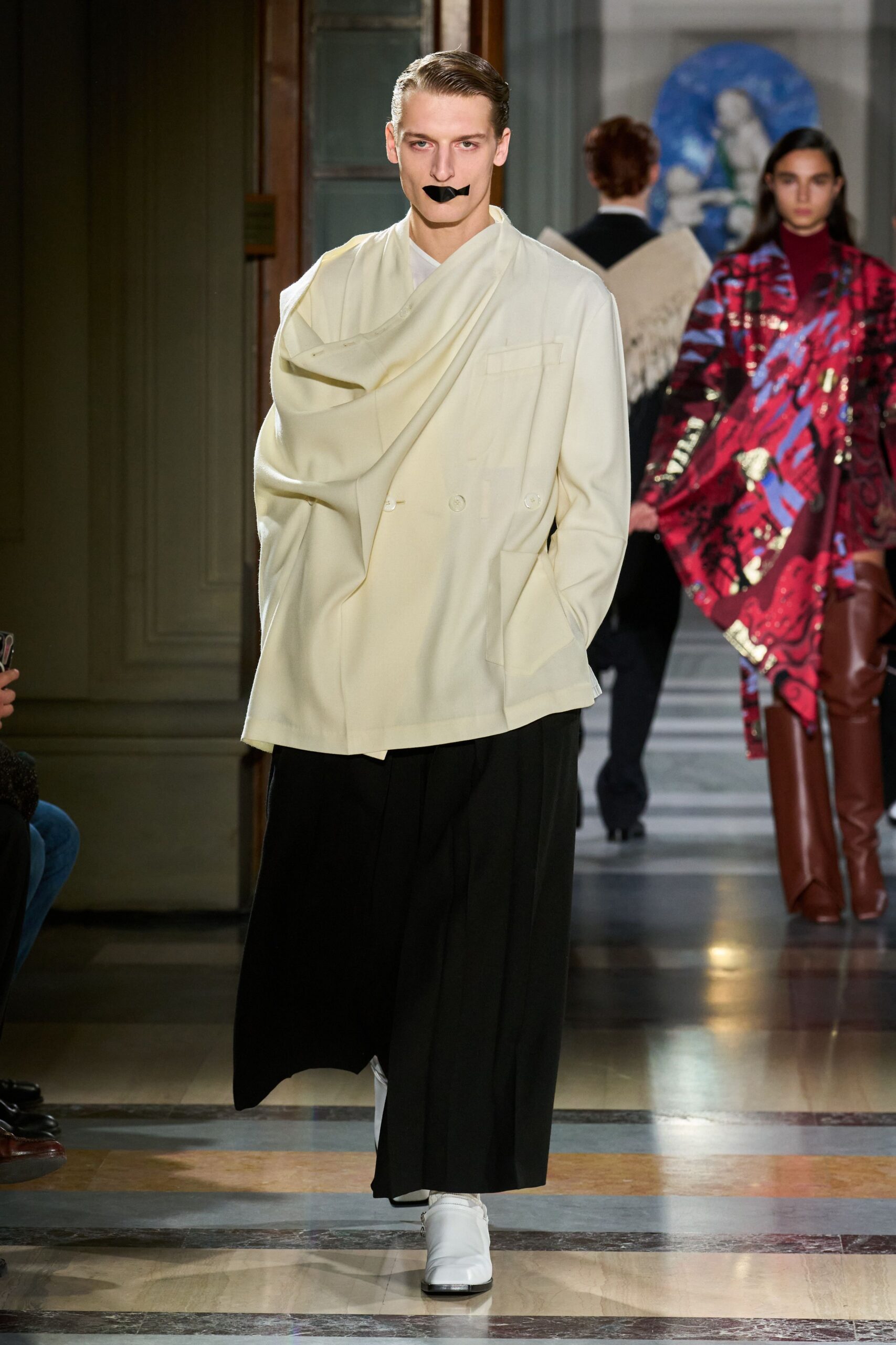 white relaxed jacket with black pants