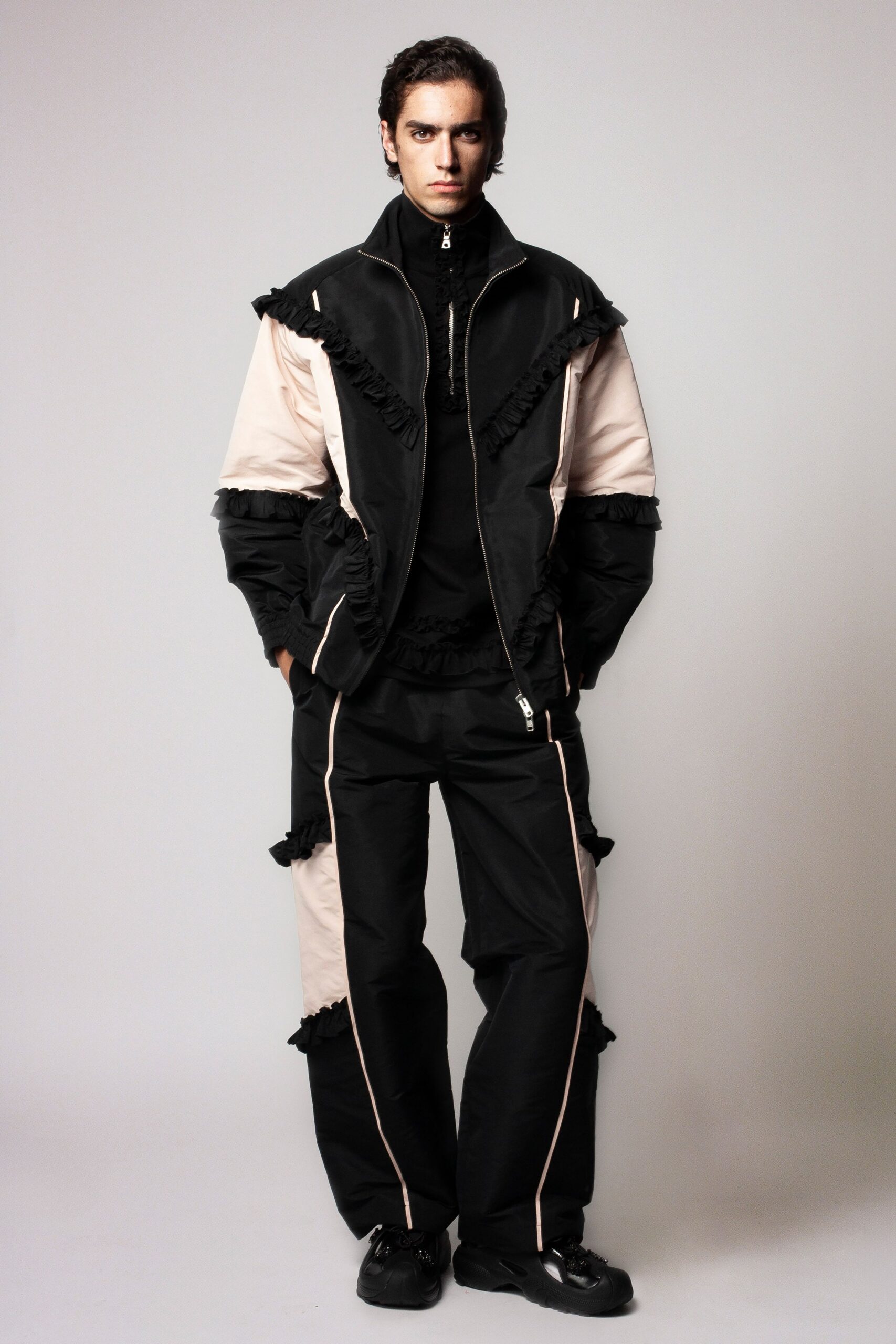 black cotton long-sleeve collared relaxed ruffled jacket