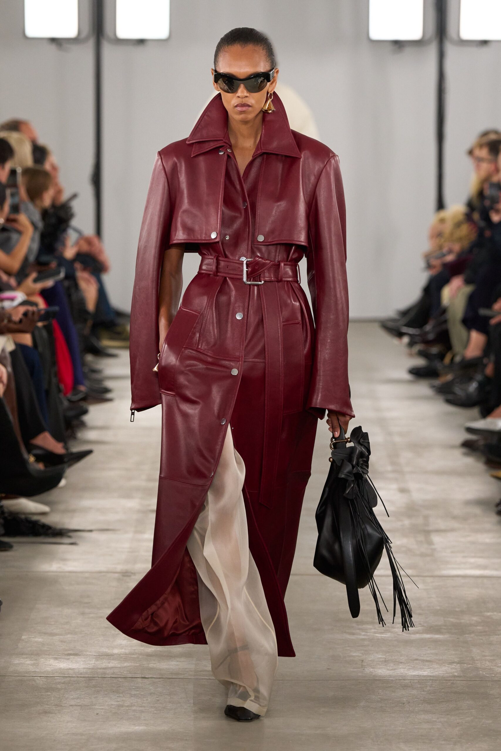 red leather long-sleeve collared fitted belted maxi coat