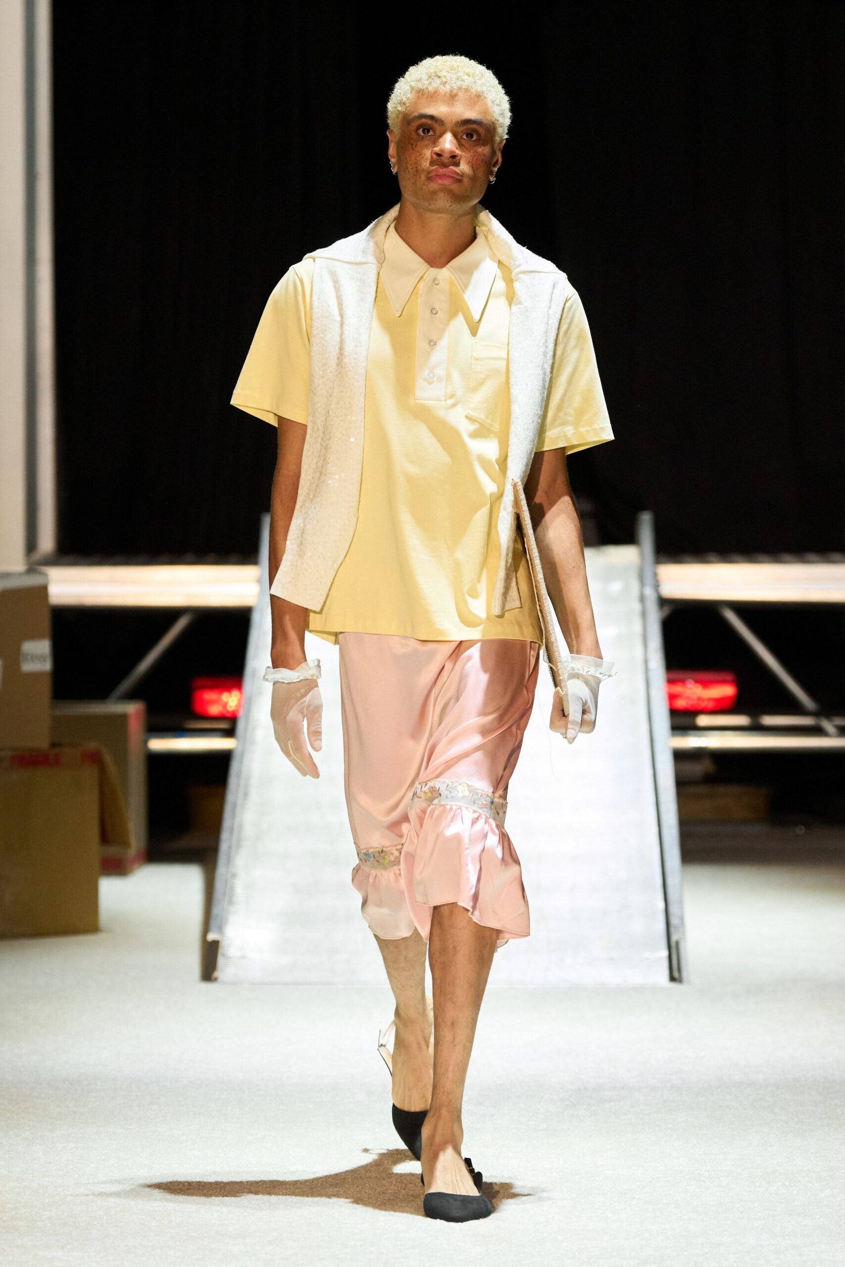 gray vest yellow shirt pink pants