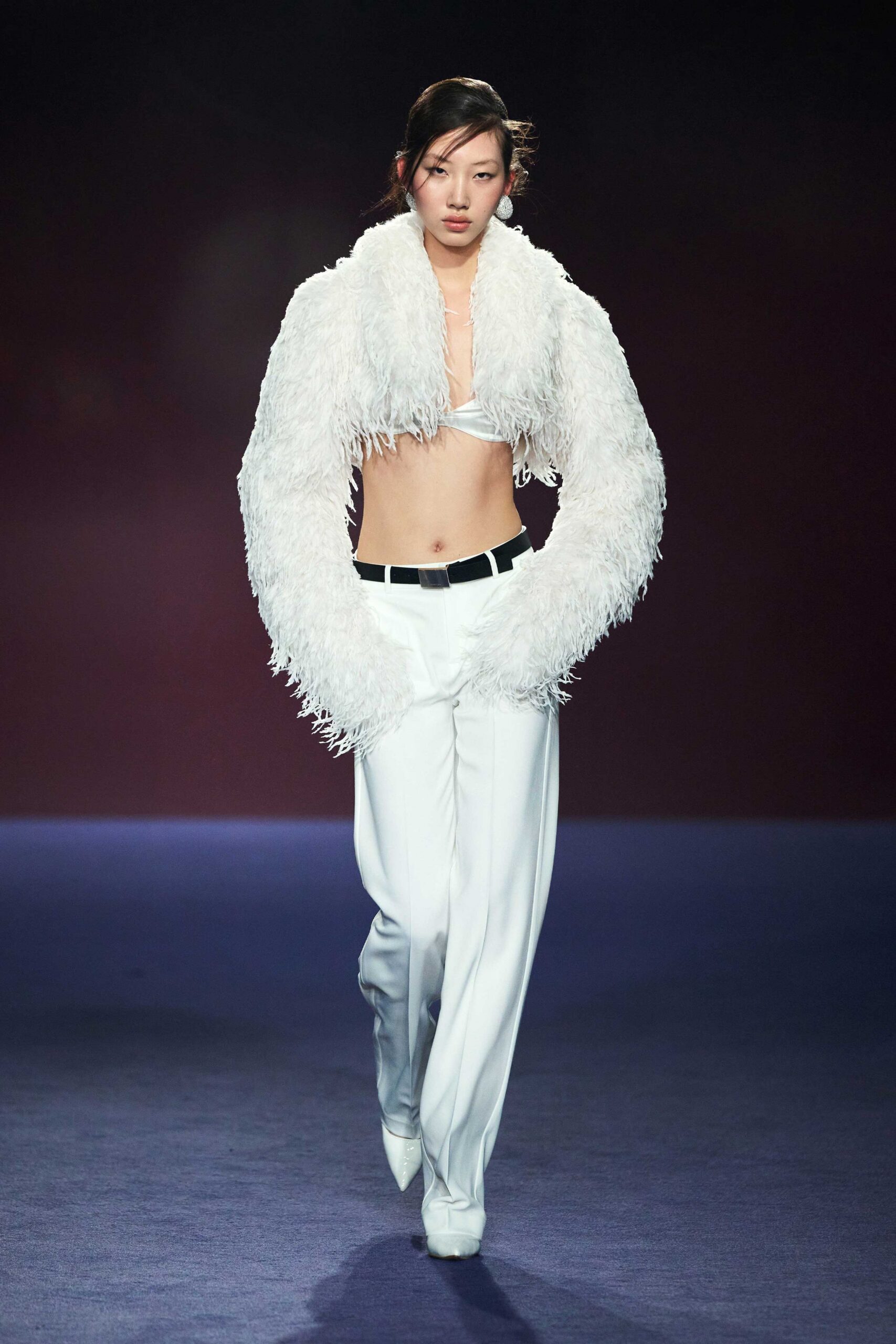 white fur jacket with tailored pants