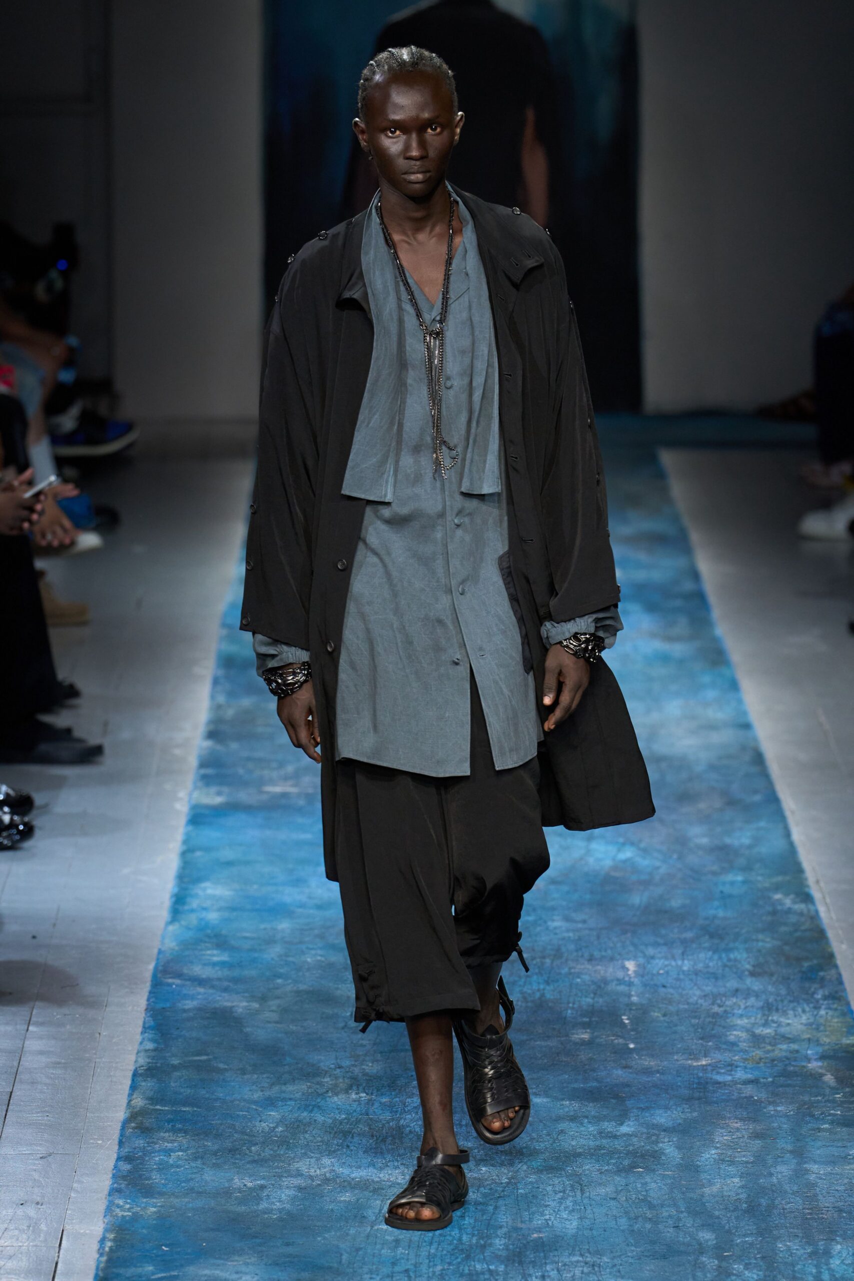 black coat blue shirt relaxed outfit