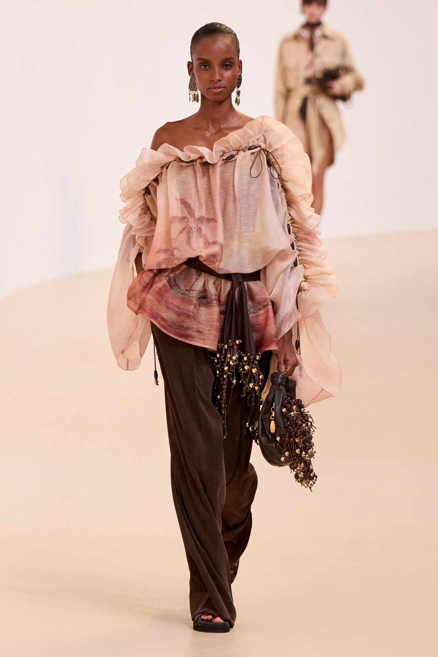 pink silk long-sleeve off-shoulder relaxed ruffled top