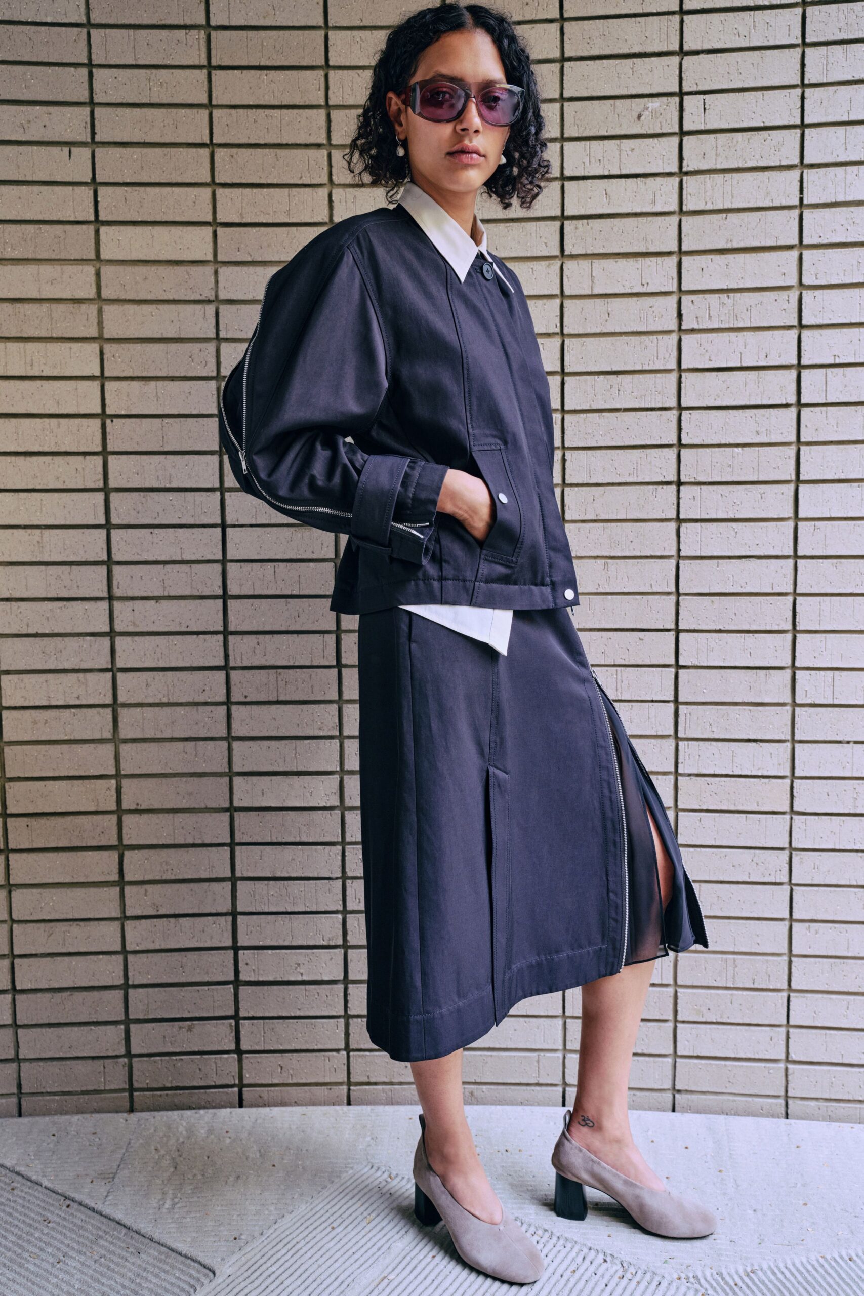 black jacket white shirt midi skirt