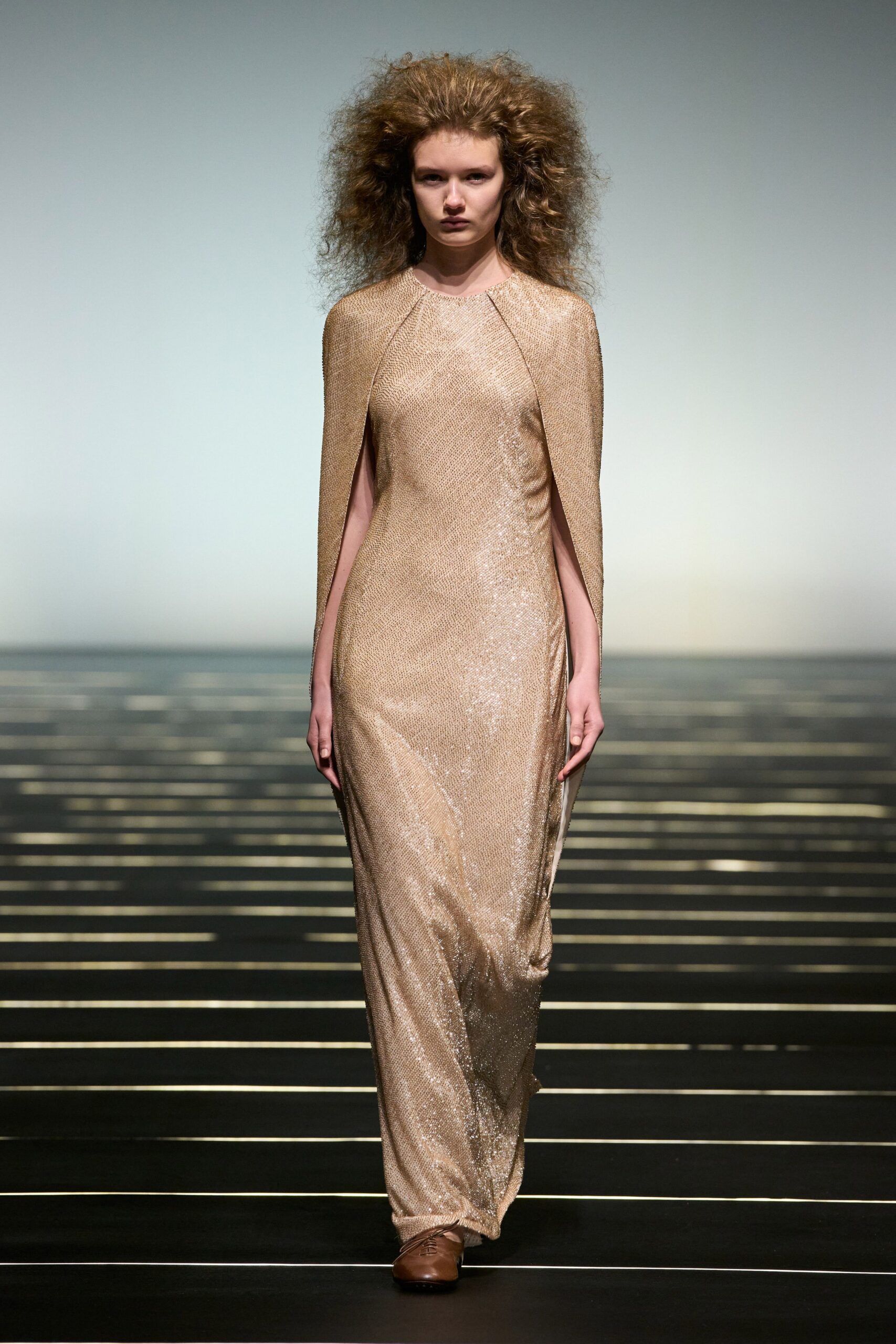 gold metallic sleeveless high-neck fitted draped shiny gown