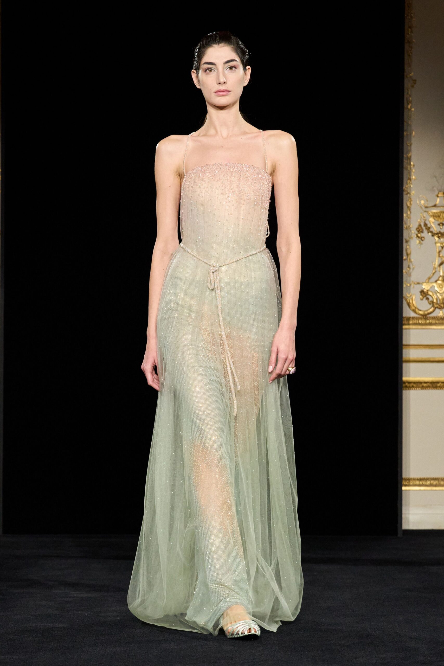 green silk sleeveless v-neck fitted pleated embellished gown