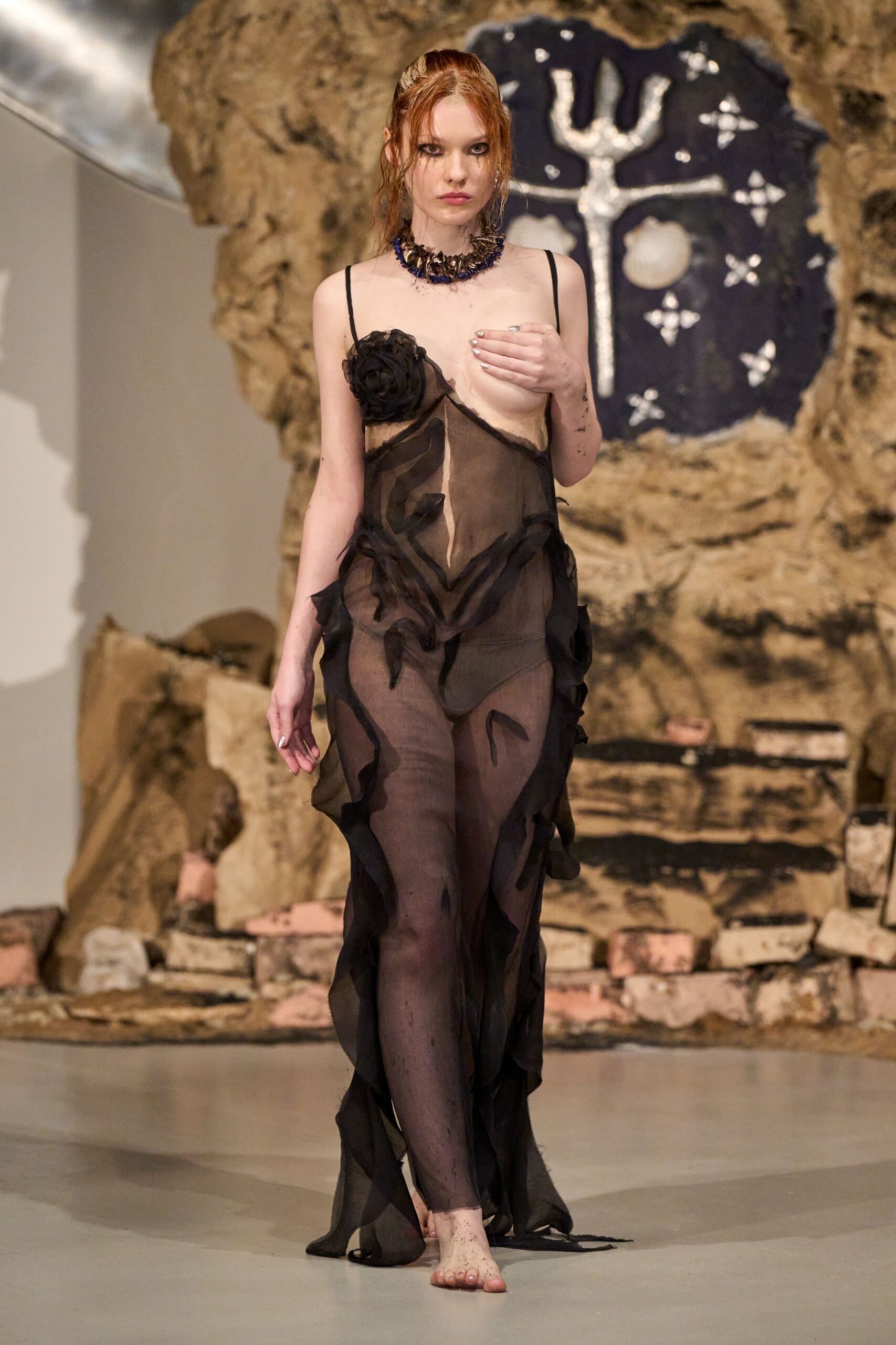 black sheer ruffled gown