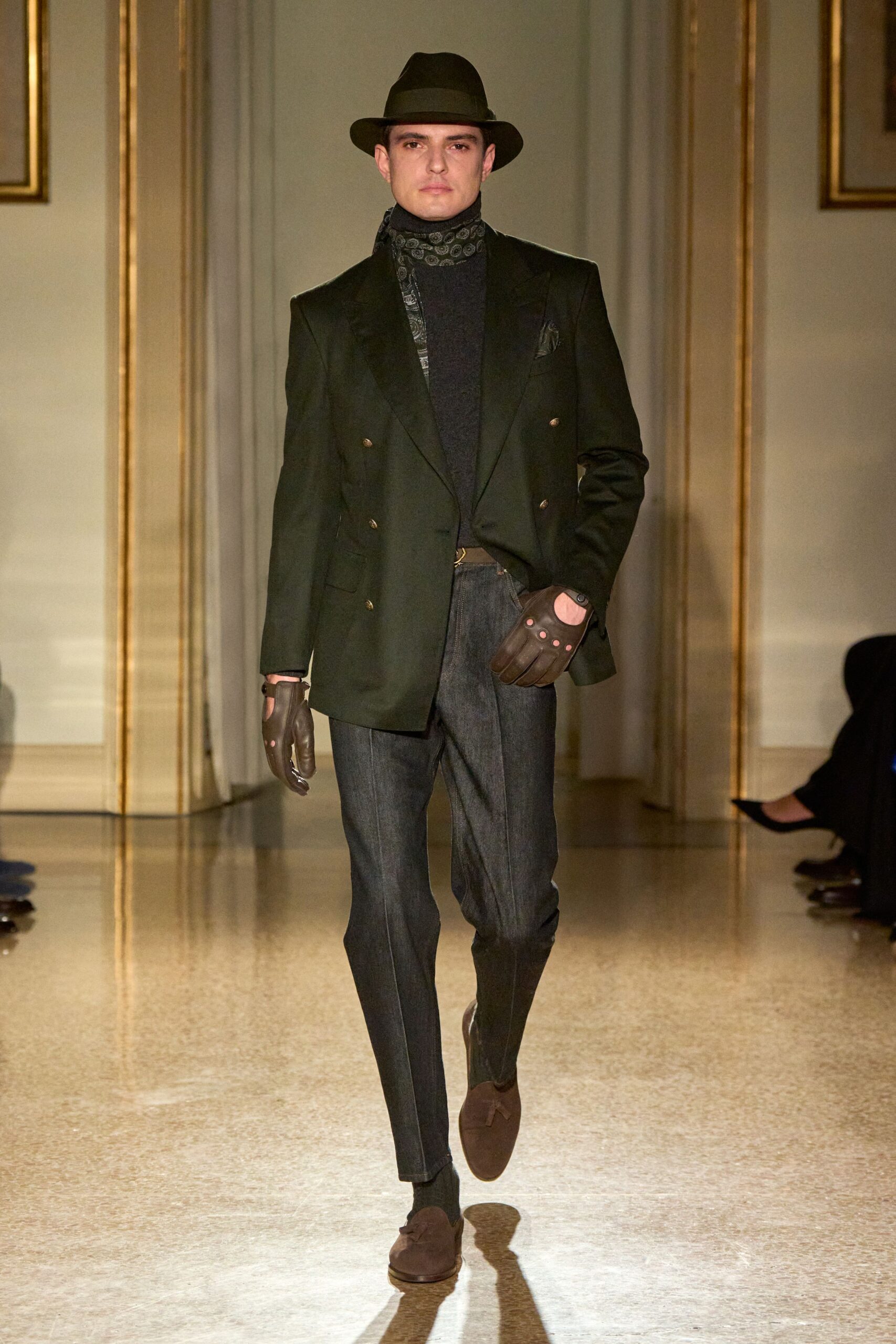 green tailored blazer with black turtleneck