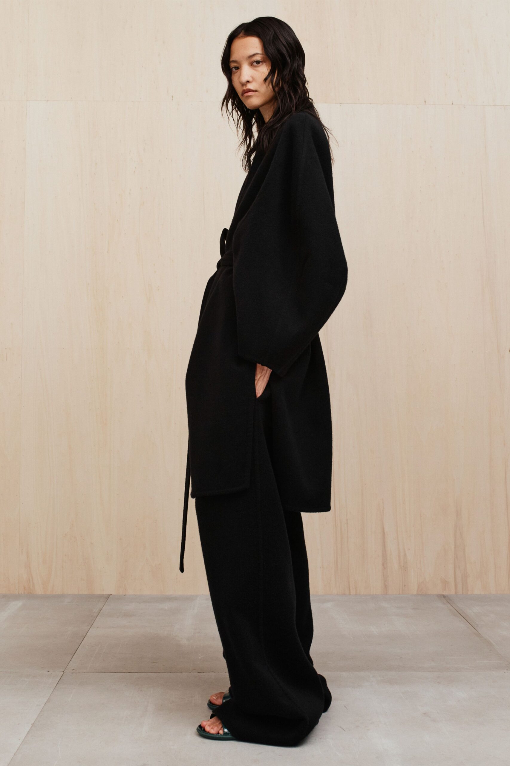 black wool long-sleeve collared relaxed belted coat