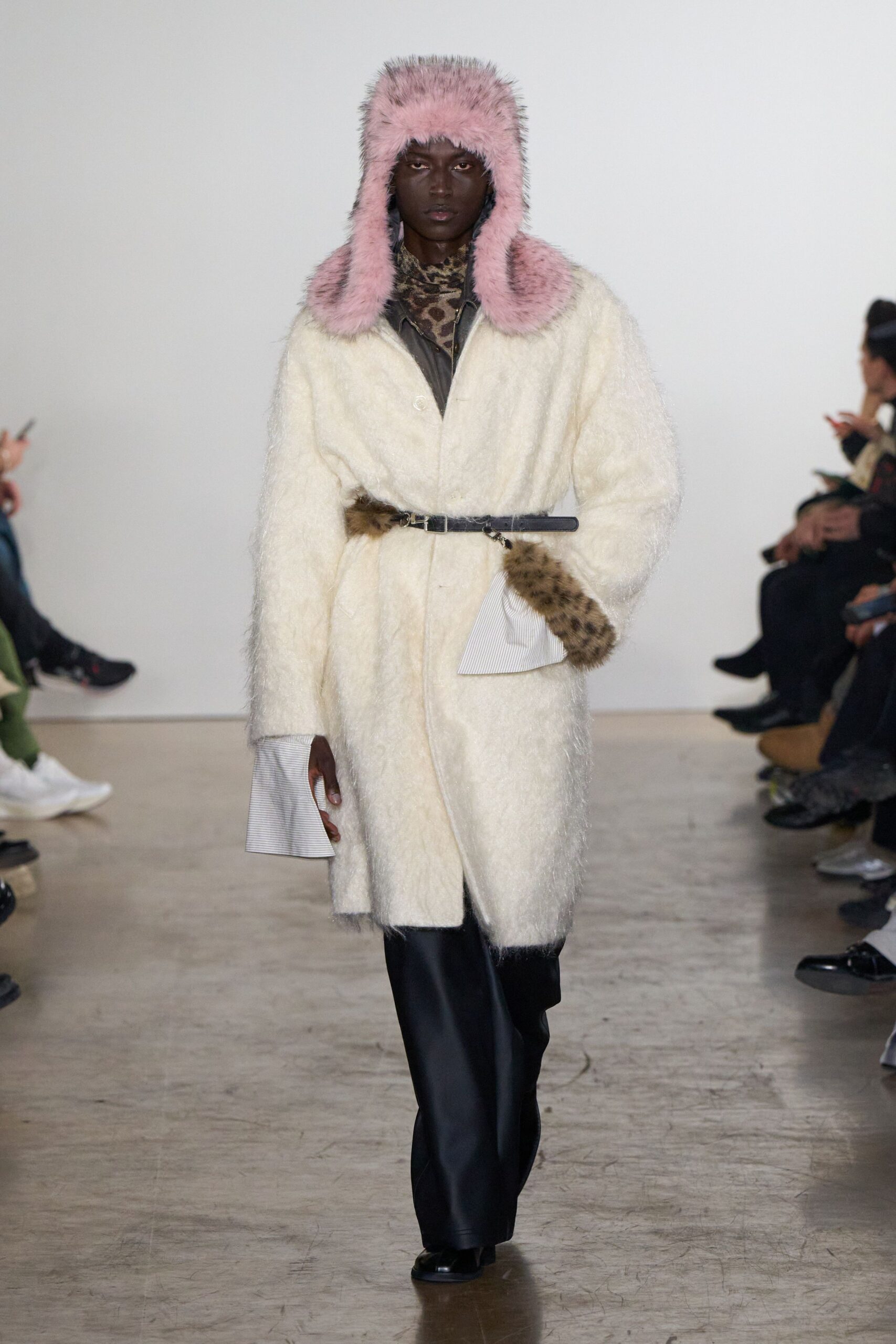 white faux-fur coat with pink hat