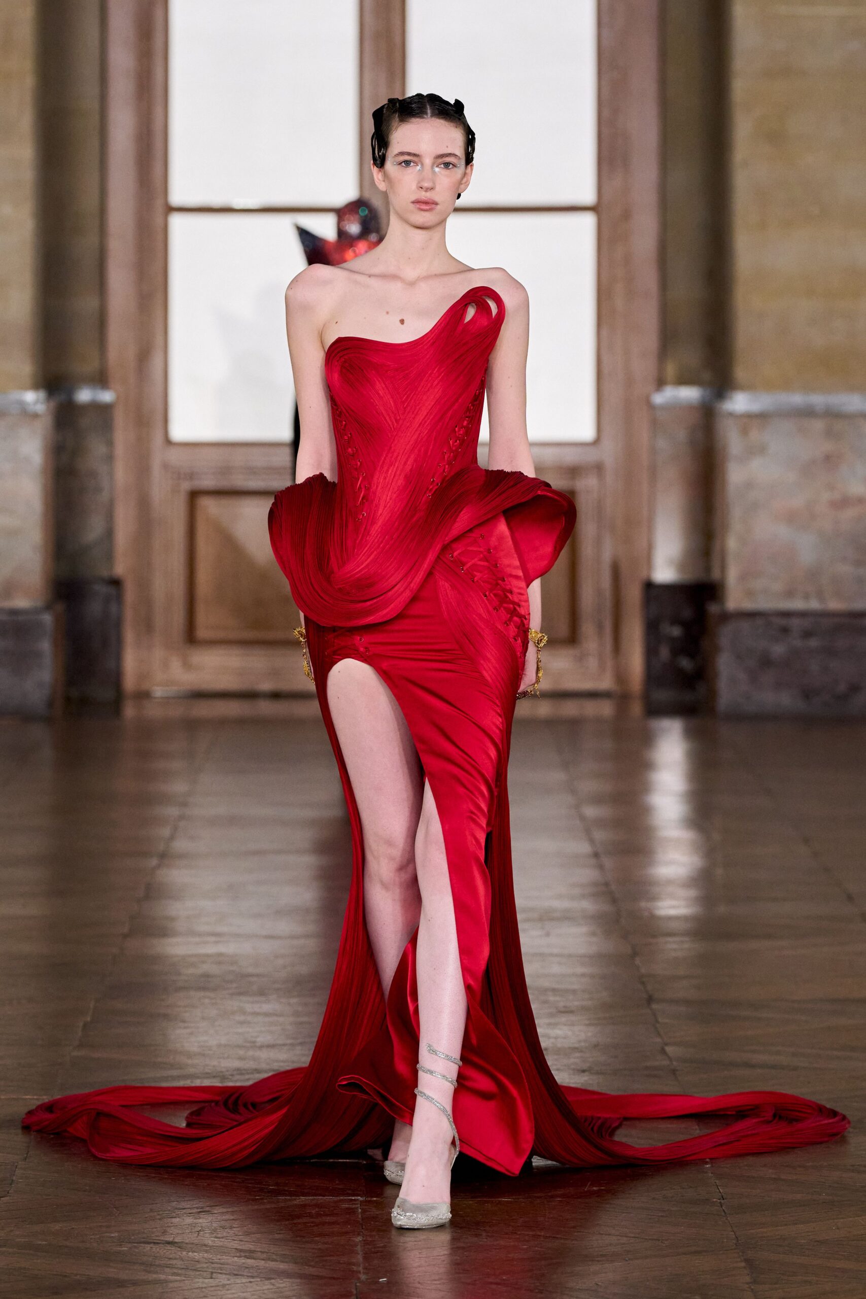 red silk strapless high-neck fitted pleated draped gown